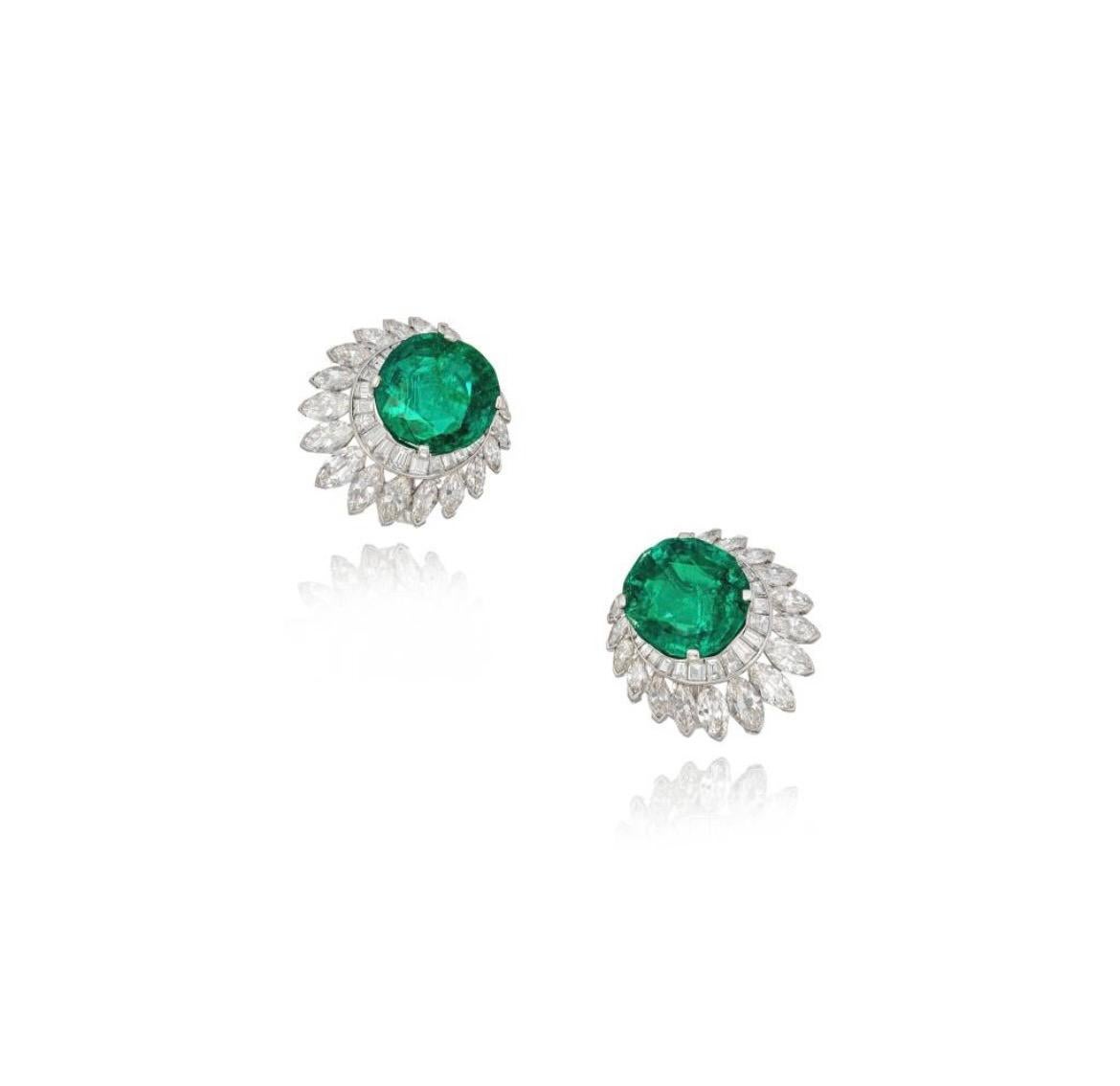 Gorgeous and lustrous Emerald and Diamond stud earrings in platinum, by Harry Winston.
The details are as follows :
Emeralds weighing 7.32 carats and 6.91 carats
Diamonds weighing a total of approx 6.05 carats ( FG color and VS clarity )
38 Baguette