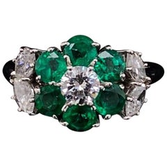 Harry Winston Emerald and Diamond Floral Cluster Platinum Engagement Ring