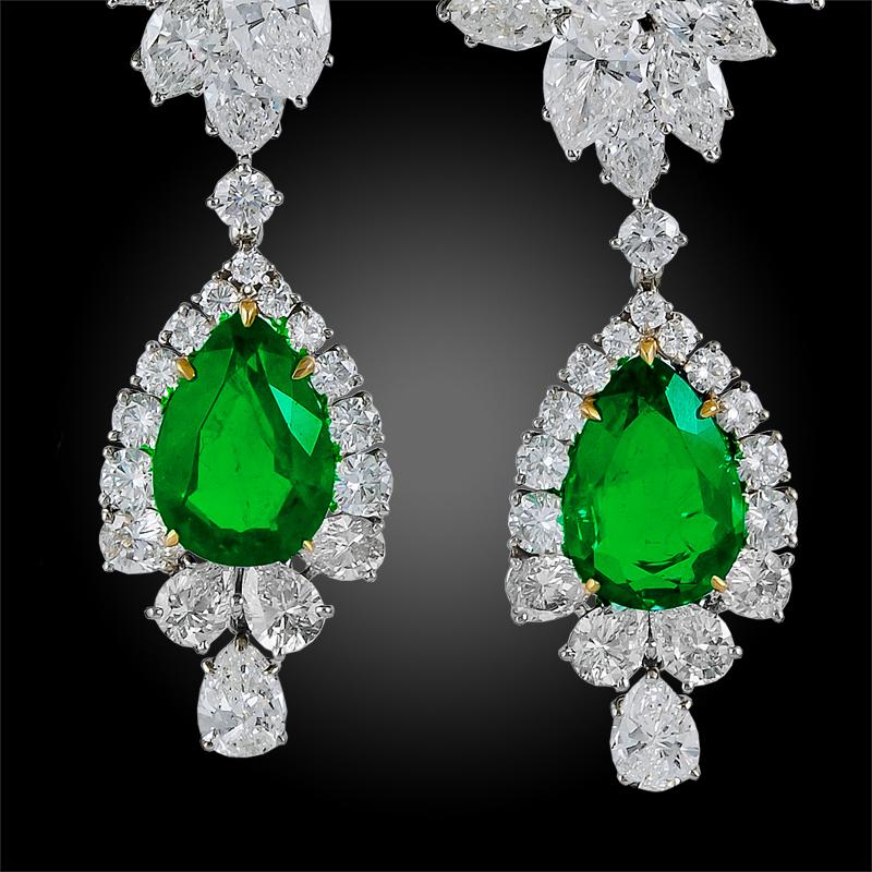 Each earring with a cluster design, set with pear-shaped and marquise-shaped diamonds, suspending a detachable pendant set with a pear-shaped emerald within a border of brilliant-cut and pear-shaped diamonds. Each signed Winston, maker's mark for