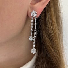 Orecchini di diamanti "Fotget- me- not" di Harry Winston