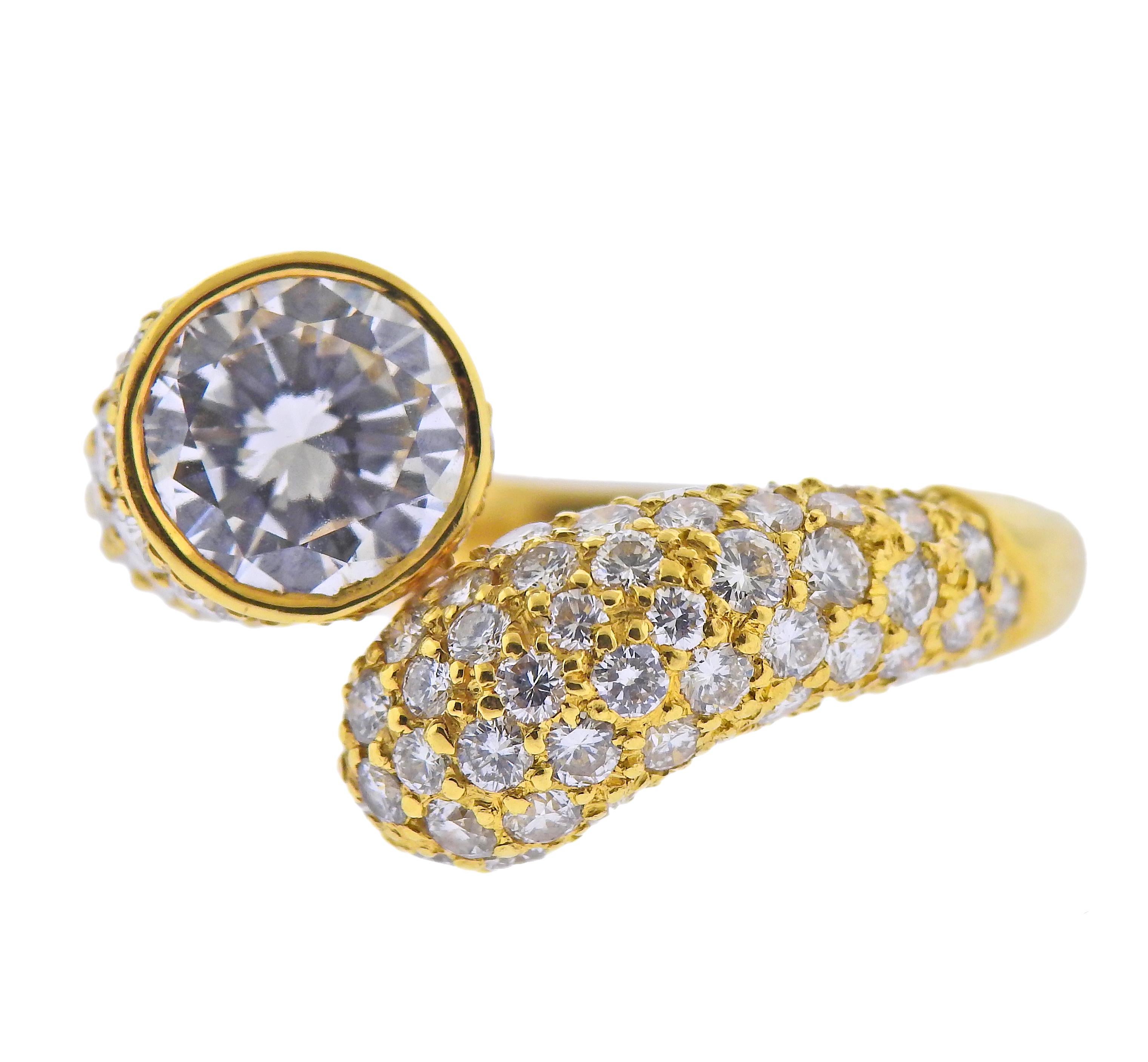 Harry Winstone 18k gold bypass ring, with a center GIA certified 2.24ct D/VVS2 diamond, surrounded with side approx. 1.70cts in diamonds. Ring size - 8.25, ring top is 17mm wide. Marked: 750 BR, Winston. Weight - 10.1 grams.