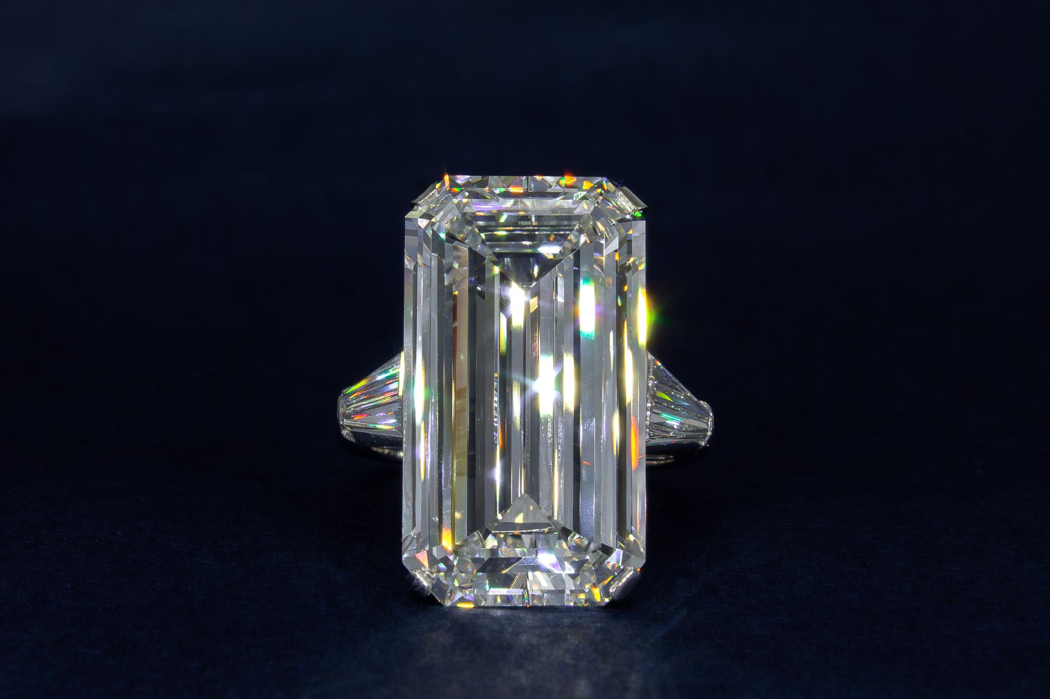 Celebrate unparalleled luxury with this Harry Winston GIA Certified 16.67 Carat Emerald Cut Diamond Ring, a masterpiece of elegance and refinement. At its heart lies a magnificent 16.67 carat emerald cut diamond, GIA certified with I color and VVS1