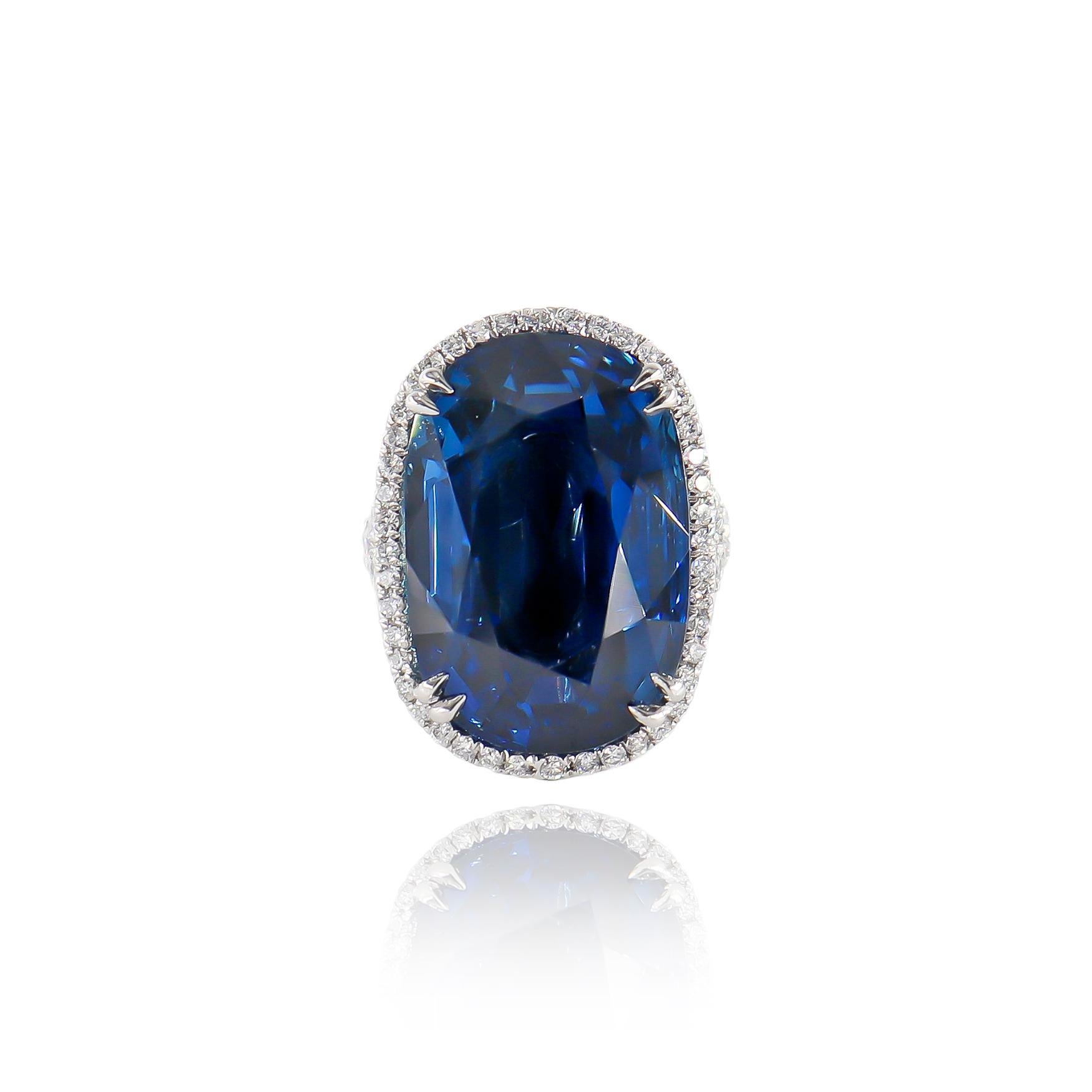 This incredible piece from the J. Birnbach vault features a 38.56 carat oval sapphire of transparent, blue color and Burma (Myanmar) origin with no indications of heat treatment (a true rarity in the gemstone marketplace*). Set in a handmade,