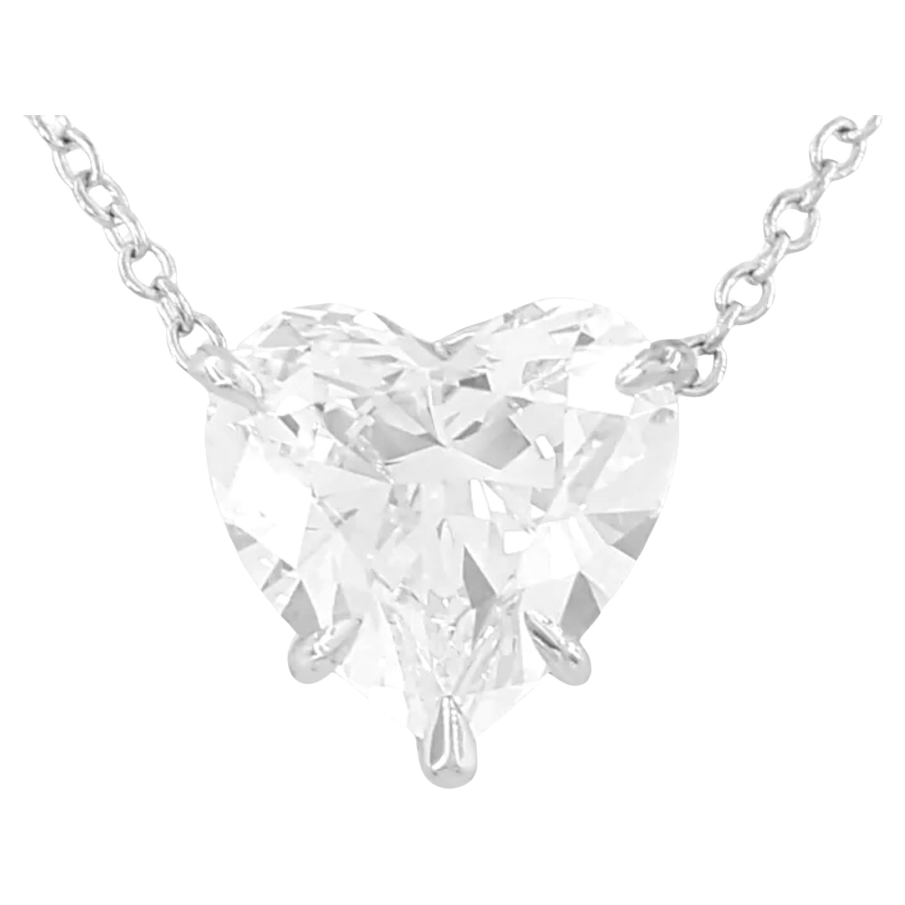 Harry Winston pendant features a stunning 2.15-carat natural heart brilliant cut diamond. The diamond possesses a G color grade and VVS2 clarity, indicating exceptional quality and brilliance. It has been finely cut with excellent proportions,