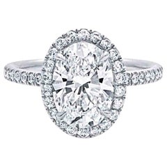 Harry Winston Inspired 1.2 Carat Oval Cut Diamond Halo Engagement Ring