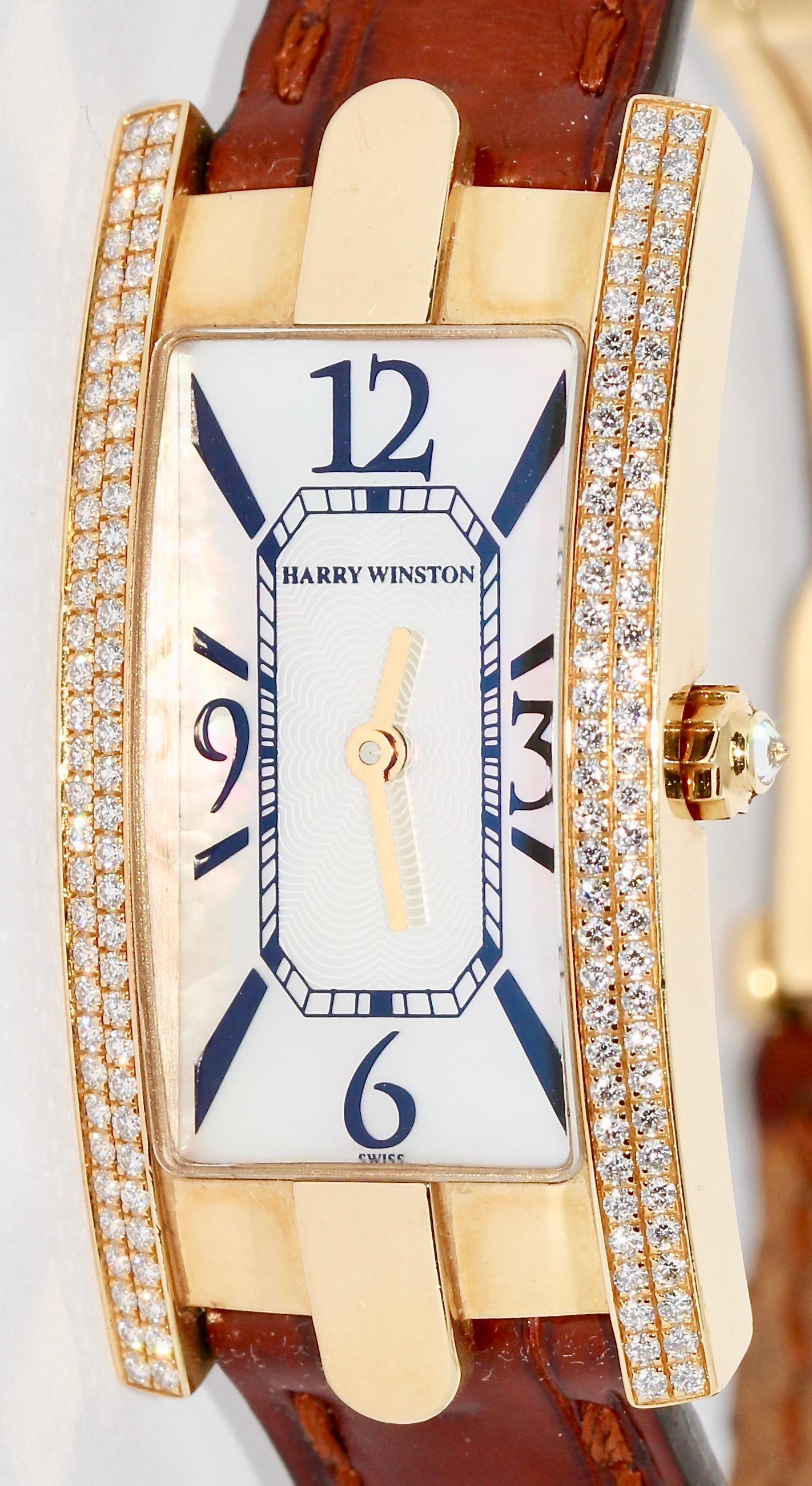 Harry Winston Lady Avenue, Ladies Wrist Watch, with Diamonds and Mother of Pearl Dial.

Case and original HW clasp in 18 Karat gold.
Original HW leather strap.

The watch will be overhauled before shipment! (New battery etc.)

Including certificate