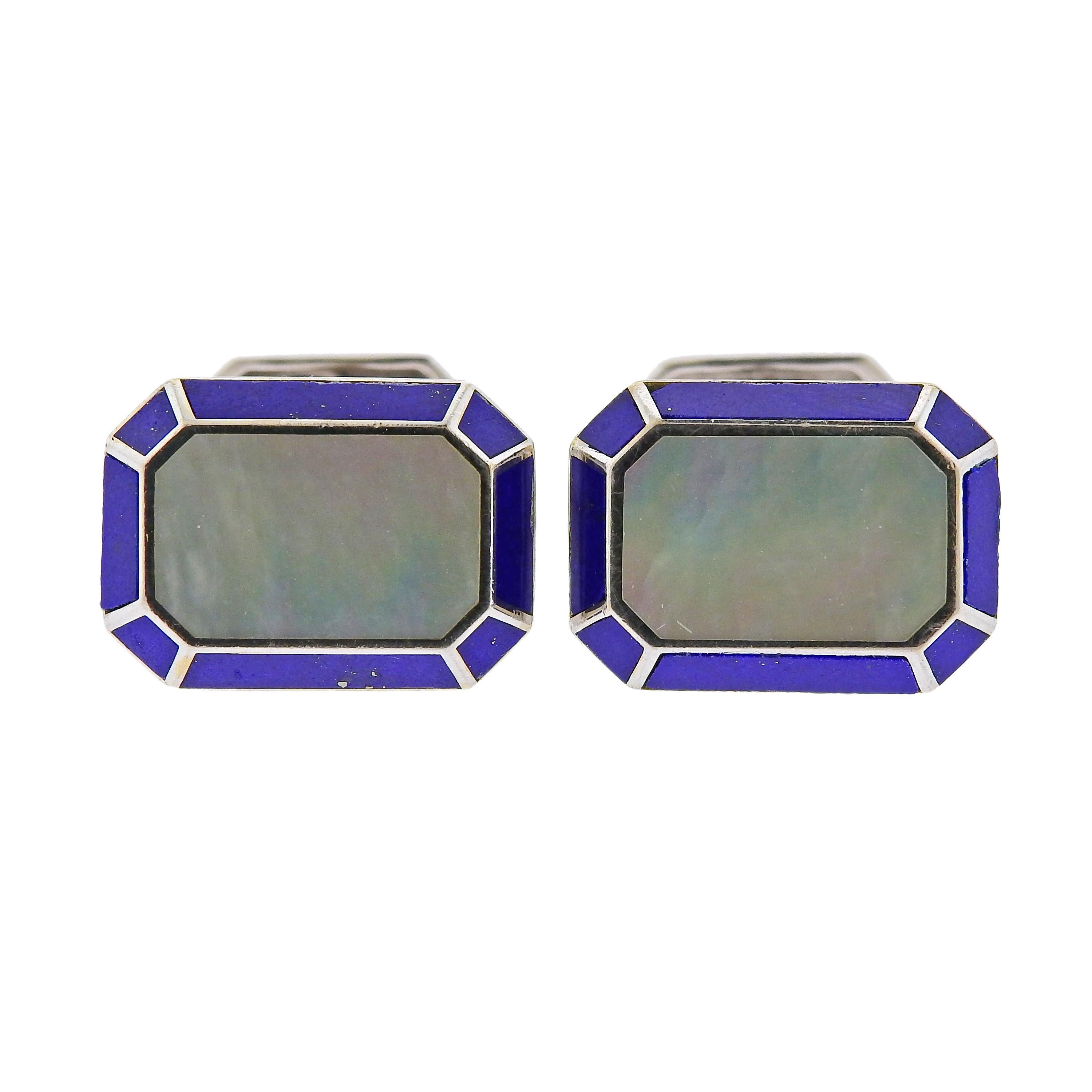 Pair of 18k white gold classic cufflinks by Harry Winston, set with mother of pearl and lapis top. Cufflink top is 18mm x 14mm, weigh 17.6 grams. Marked: HW, 750, 120682.