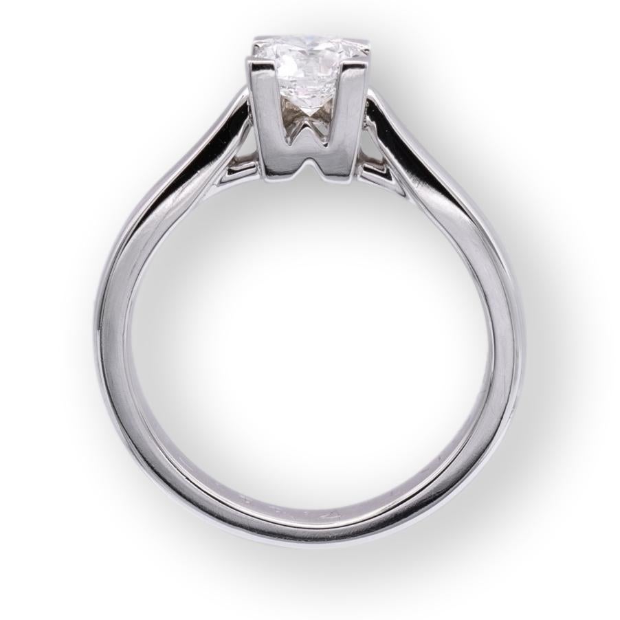 Contemporary Harry Winston Logo Platinum Round Diamond .51 ct FVVS2 Engagement Ring