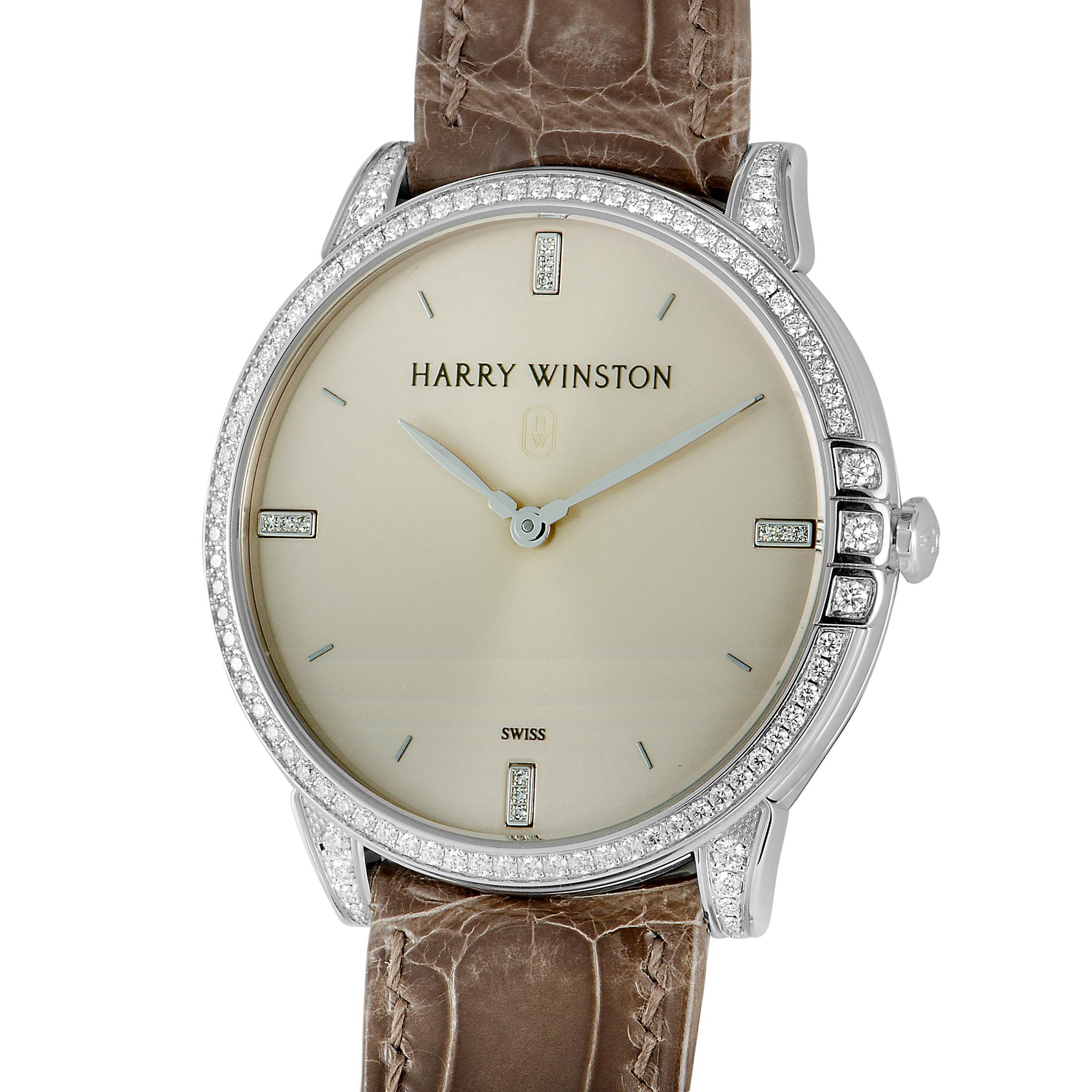 The Harry Winston Midnight 39 mm, reference number MIDQHM39WW002, is created for the sublime “Midnight” collection.

Presented on a taupe leather strap fitted with a tang buckle, the watch comes with a diamond-set 18K white gold case that has a