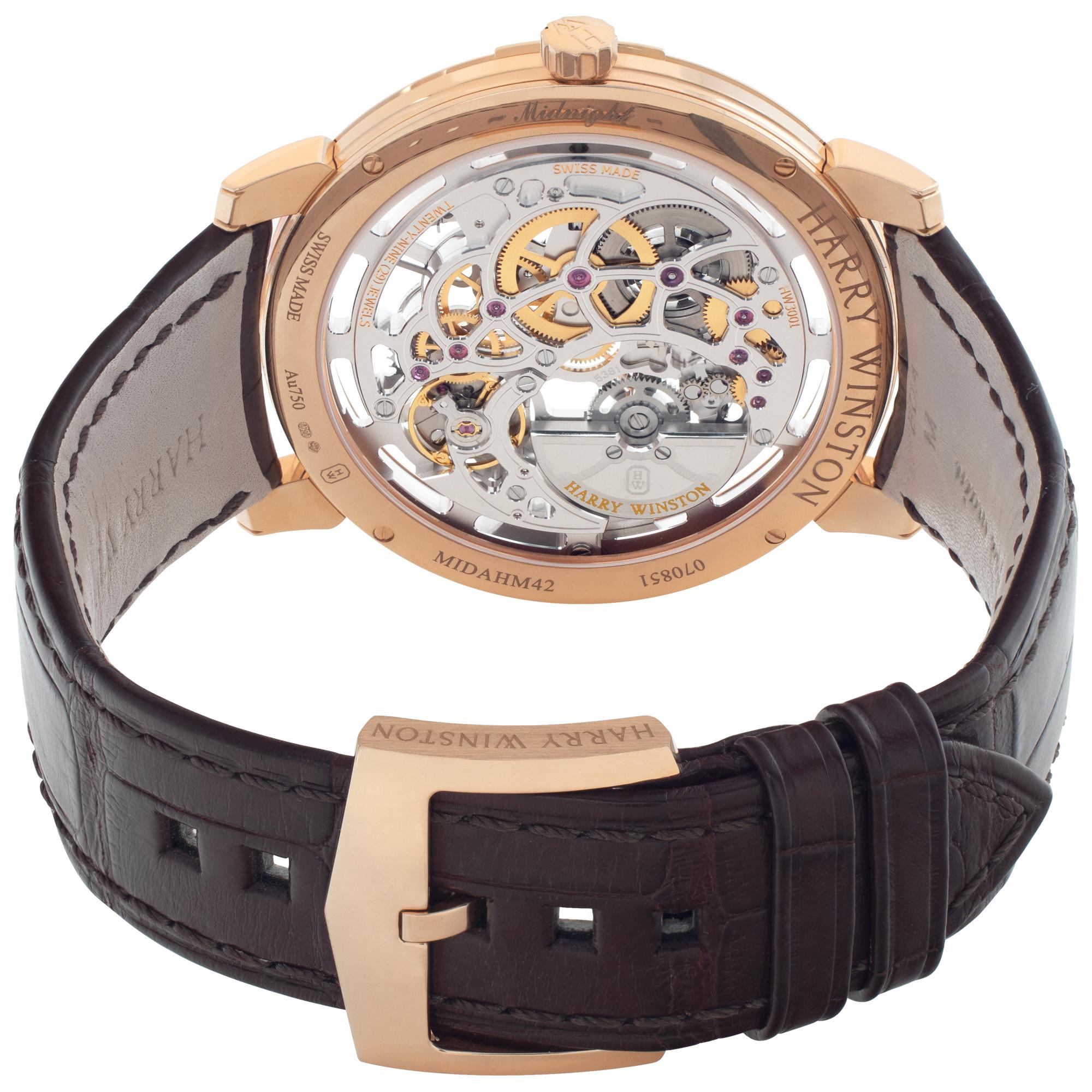 Harry Winston Midnight Skeleton in 18k rose gold on a brown crocodile leather strap with 18k rose gold tang buckle. Auto. With box and papers. Circa 2020. Ref MIDAHM42RR001. Fine Pre-owned Harry Winston Watch.