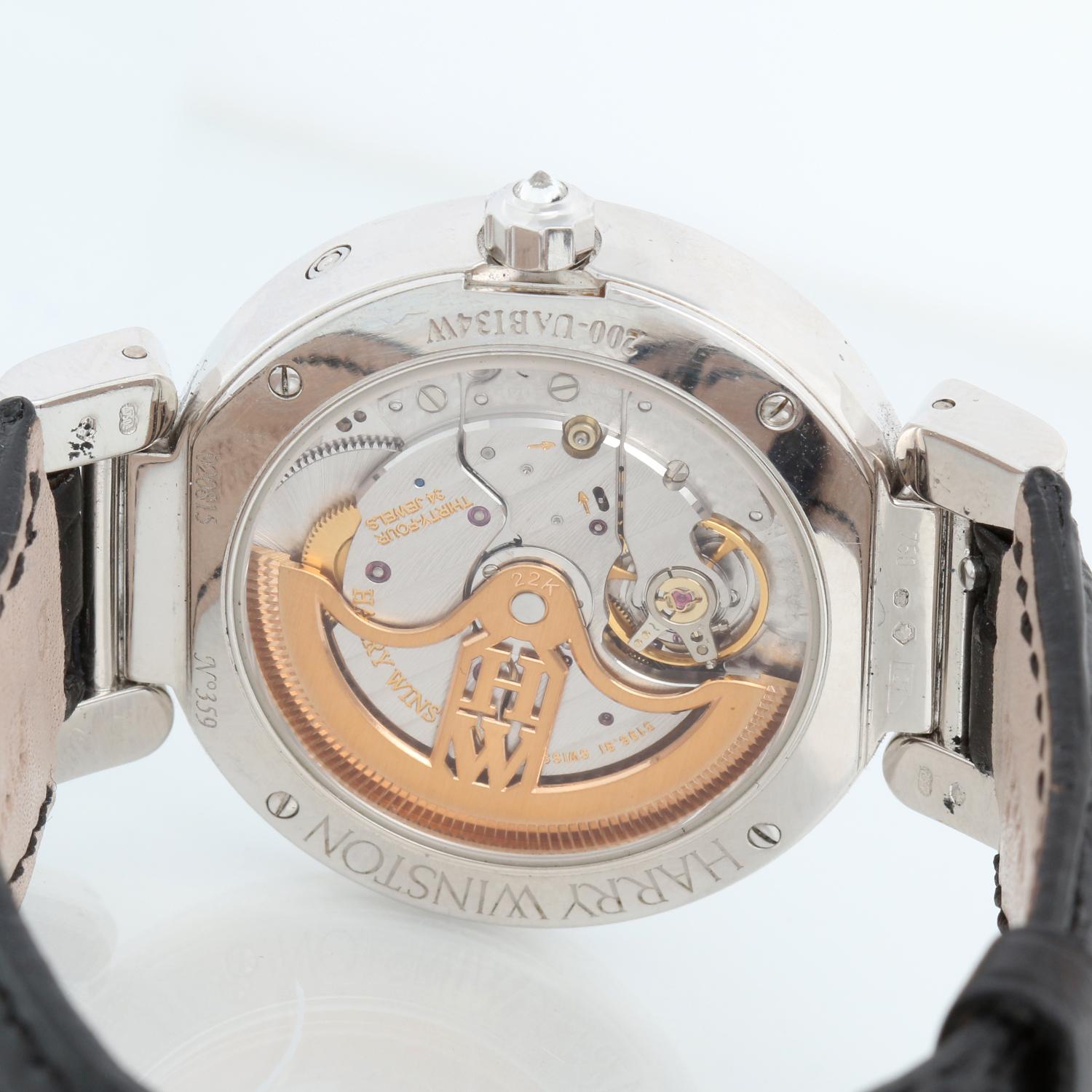 Harry Winston Ocean Biretrograde 18K White Gold  Watch UAB134W - Automatic winding. 18K White gold with diamond bezel ( 36 mm ). Mother of Pearl dial with pave diamonds on subdials. Brand new Harry Winston leather strap with 18K white gold pave