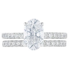 Harry Winston Oval Diamond Engagement Ring 
Pave Wedding Band Set