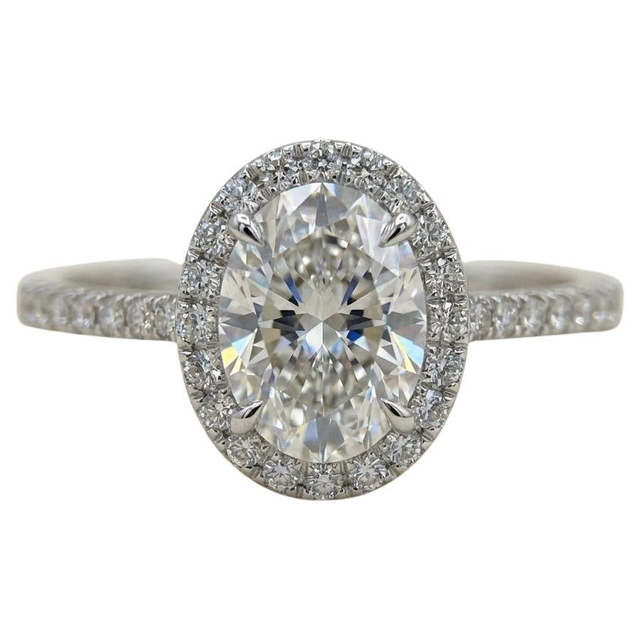 Harry Winston Oval-Shaped Diamond Micropavé Halo Engagement Ring