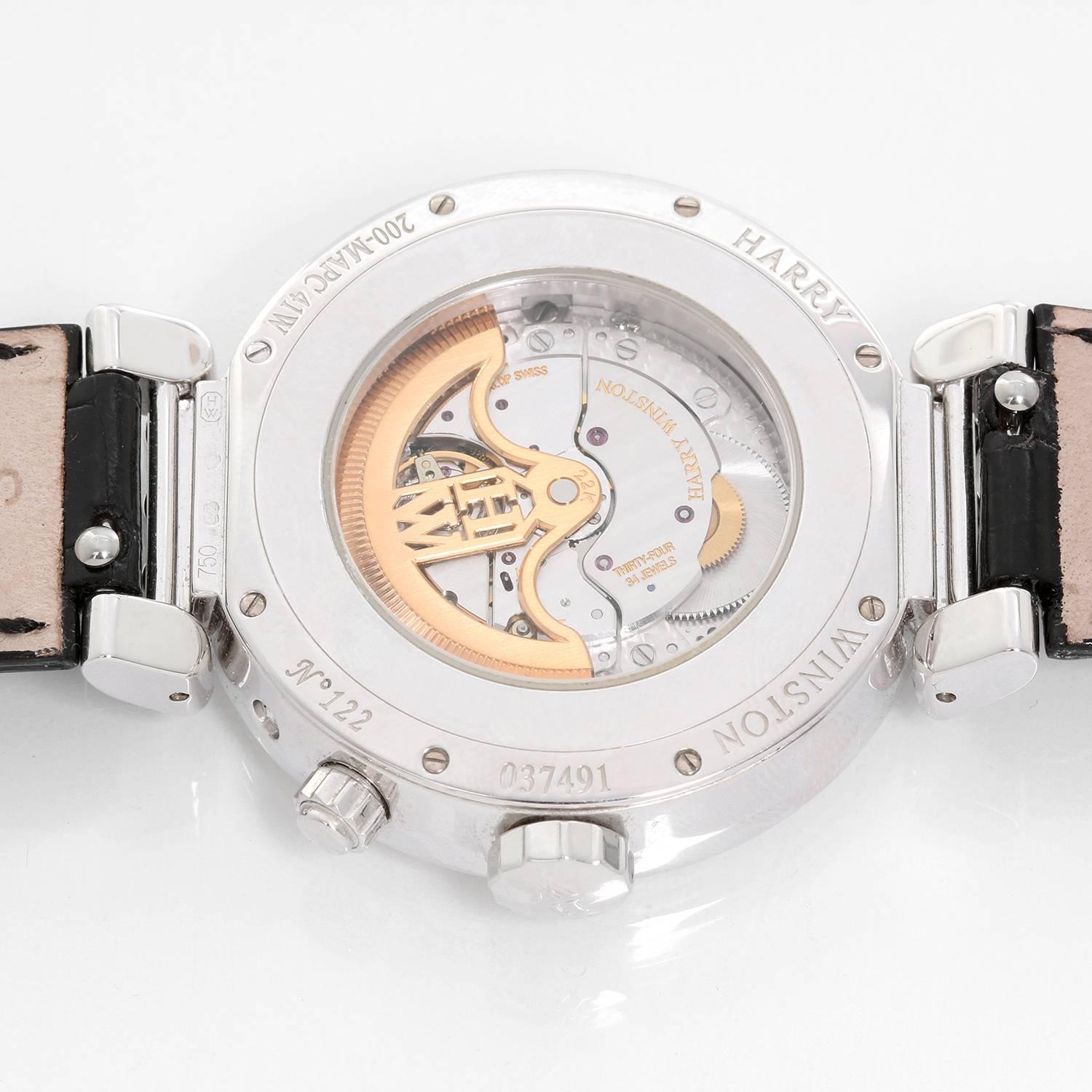 Harry Winston Perpetual Calendar Premier Excenter Watch -  Automatic. 18K White Gold case ( 41 mm ). Dark grey dial; Excentered hours and minutes, second time-zone, perpetual calendar with retrograde date and month, leap year, moon phase indicator.