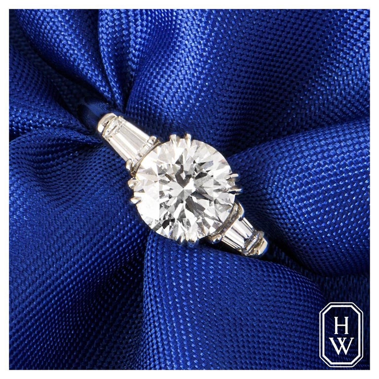Harry Winston Platinum Diamond Classic Tapered Baguette Ring 1.51ct E/VS2  at 1stDibs | classic winston cushion-cut engagement ring with tapered  baguette side stones, harry winston tapered baguette, classic winston round  brilliant engagement