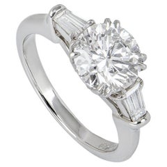 Harry Winston Platinum Diamond Classic Tapered Baguette Ring 1.51ct E/VS2  at 1stDibs | classic winston cushion-cut engagement ring with tapered  baguette side stones, harry winston tapered baguette, harry winston  baguette ring