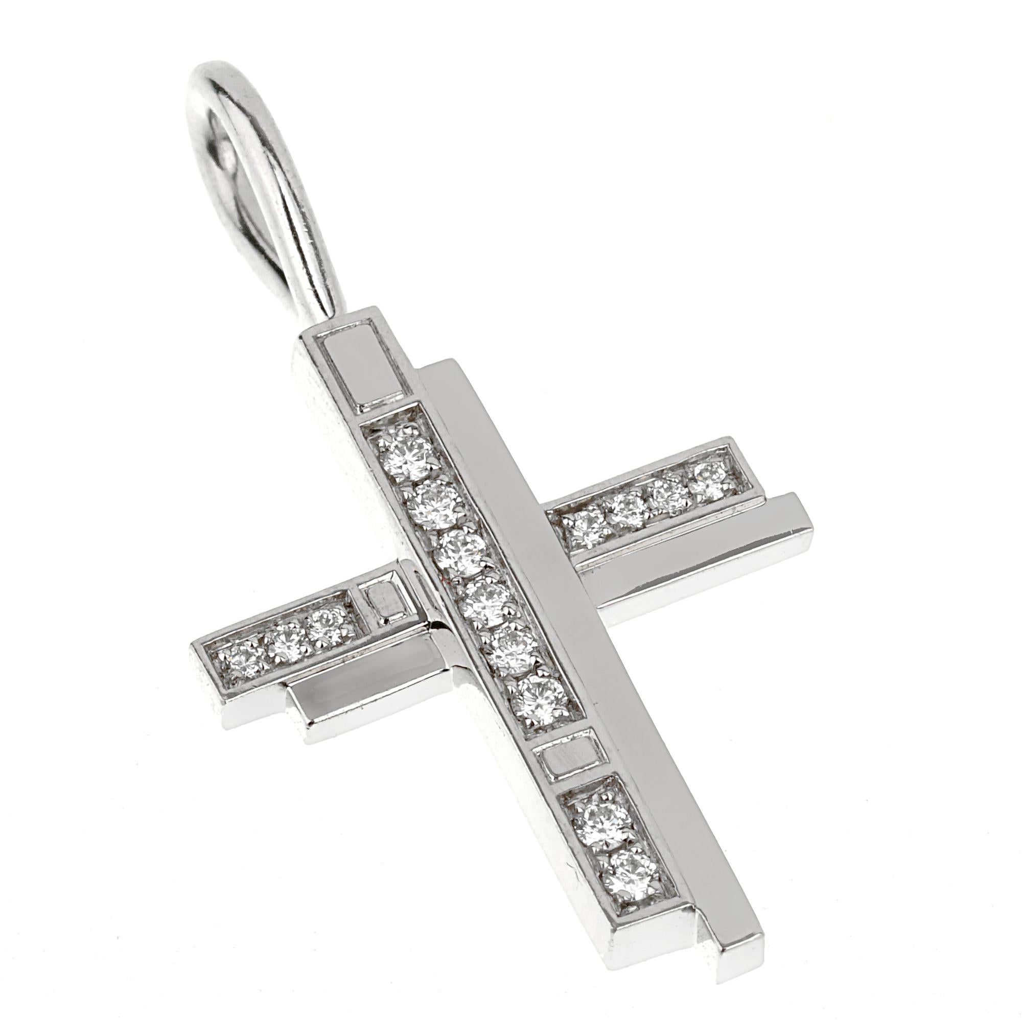 Designed with round brilliant cut diamonds this Harry Winston collection imitates the busy avenues of Manhattan. The cross pendant is set with 15 of the finest original Harry Winston diamonds totaling .09ct. 