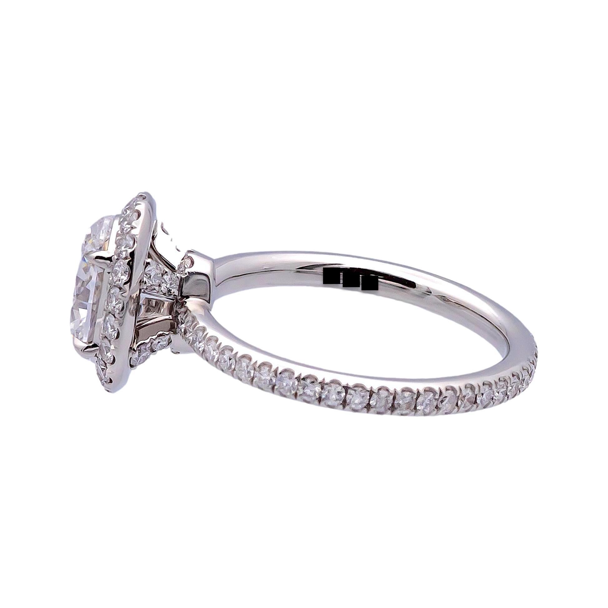 Modern Harry Winston Platinum Halo Oval Diamond 1.54ct TW DVVS1 Engagement Ring SZ 4.25