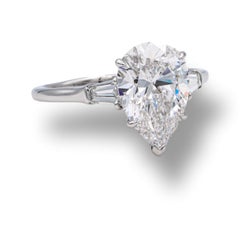 Harry Winston Platinum Pear Shape Diamond Engagement Ring with Baguettes Circa 1