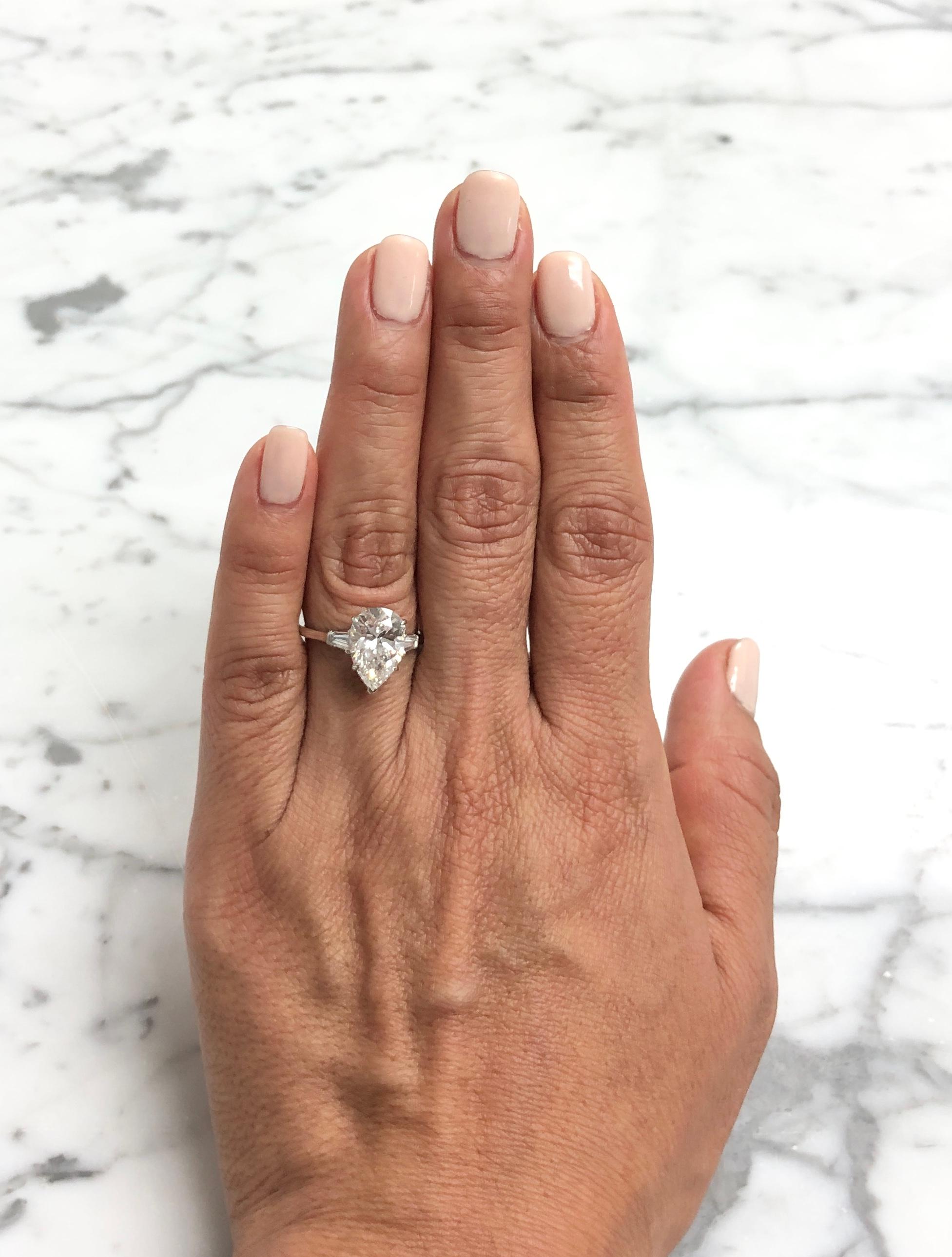 Harry Winston Platinum Pear Shape Diamond Engagement Ring with Baguettes Circa 1 1