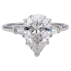 Harry Winston Platinum Pear Shape Diamond Engagement Ring with Baguettes Circa 1