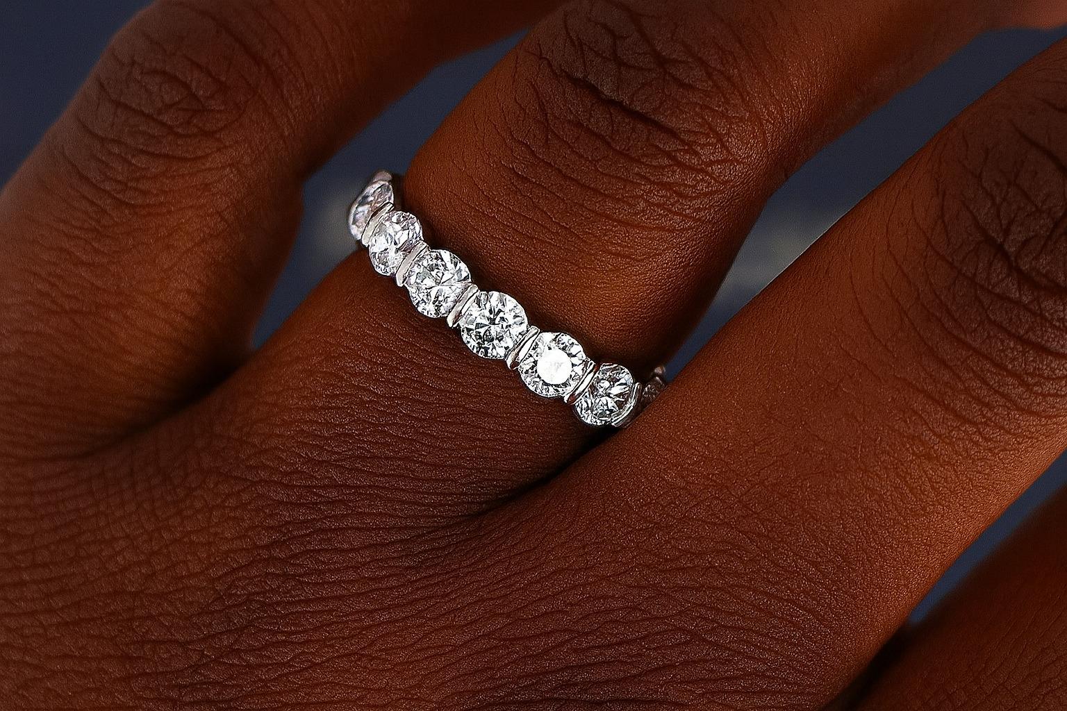Harry Winston Platinum Round Diamond Bar-Set Eternity Wedding Band, a timeless design crafted with the house’s signature precision and elegance.

Craftsmanship: Platinum band weighing 7.4 grams, with a refined 4.2 mm profile.

Diamonds: Set with 16