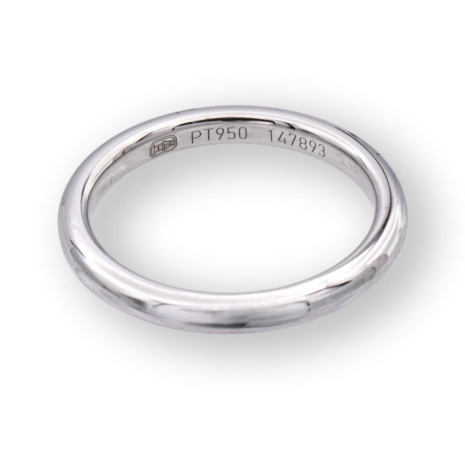 Harry Winston wedding band ring finely crafted in platinum measuring 2mm wide in a rounded comfort fit. Fully hallmarked with logo, serial number and metal content.

Ring Specifications
Brand: Harry Winston
Style: Wedding Band
Hallmarks: H.W PT950