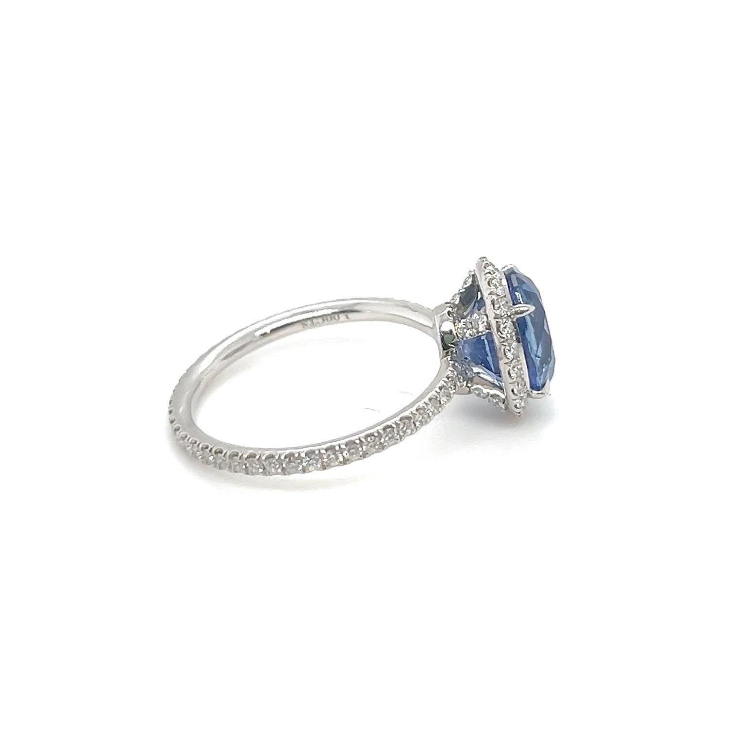 Contemporary Harry Winston Platinum Sapphire and Diamond Ring For Sale