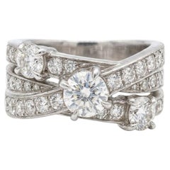 Anillo Harry Winston de platino con tres filas de diamantes redondos brillantes