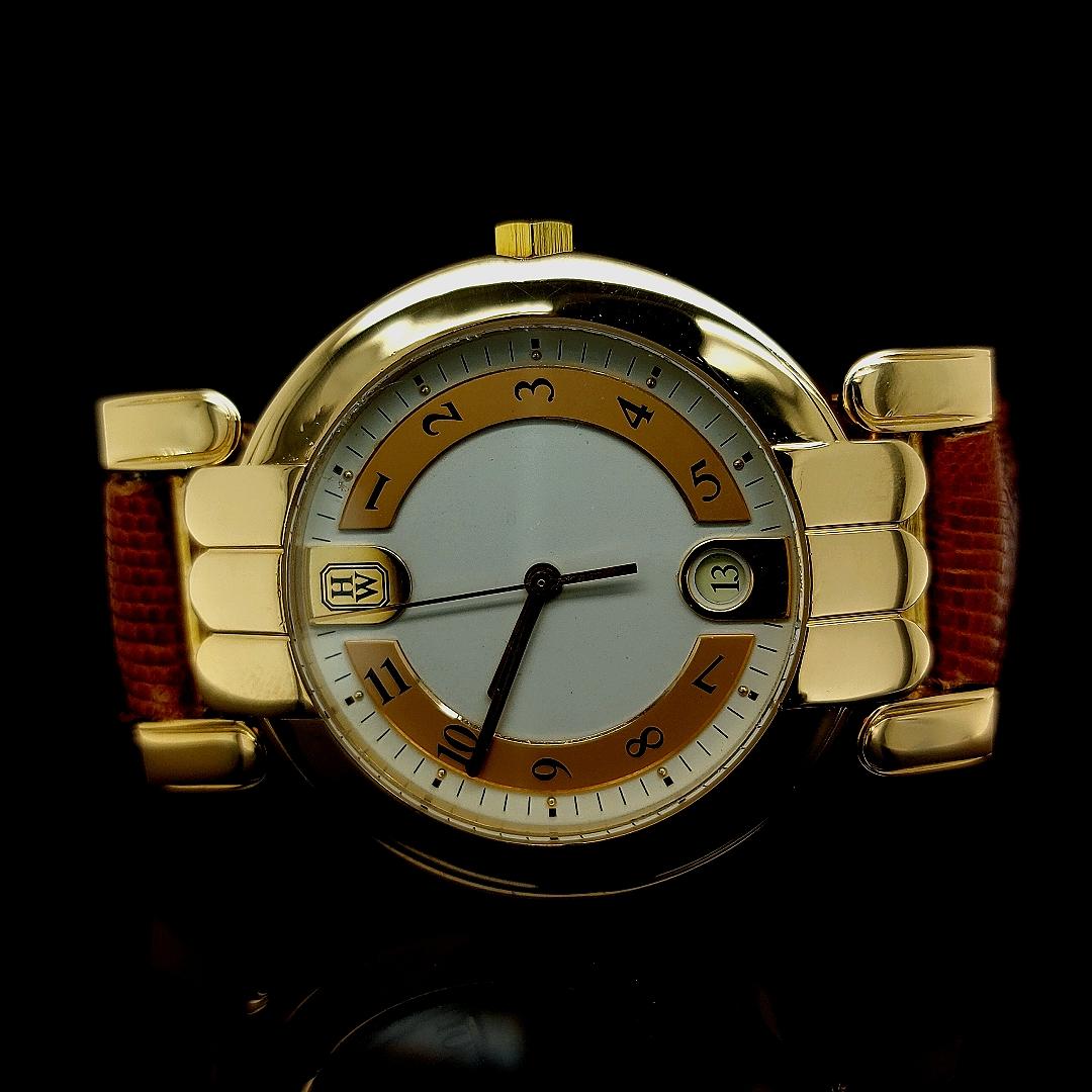 Harry Winston Premier 18K solid Yellow gold with solid gold Harry Winston folding clasp,Model MQ 34 GL Classic 

Beautiful and elegant solid gold Harry Winston wrist watch for daily use or special occasions.

You can t go wrong with such a