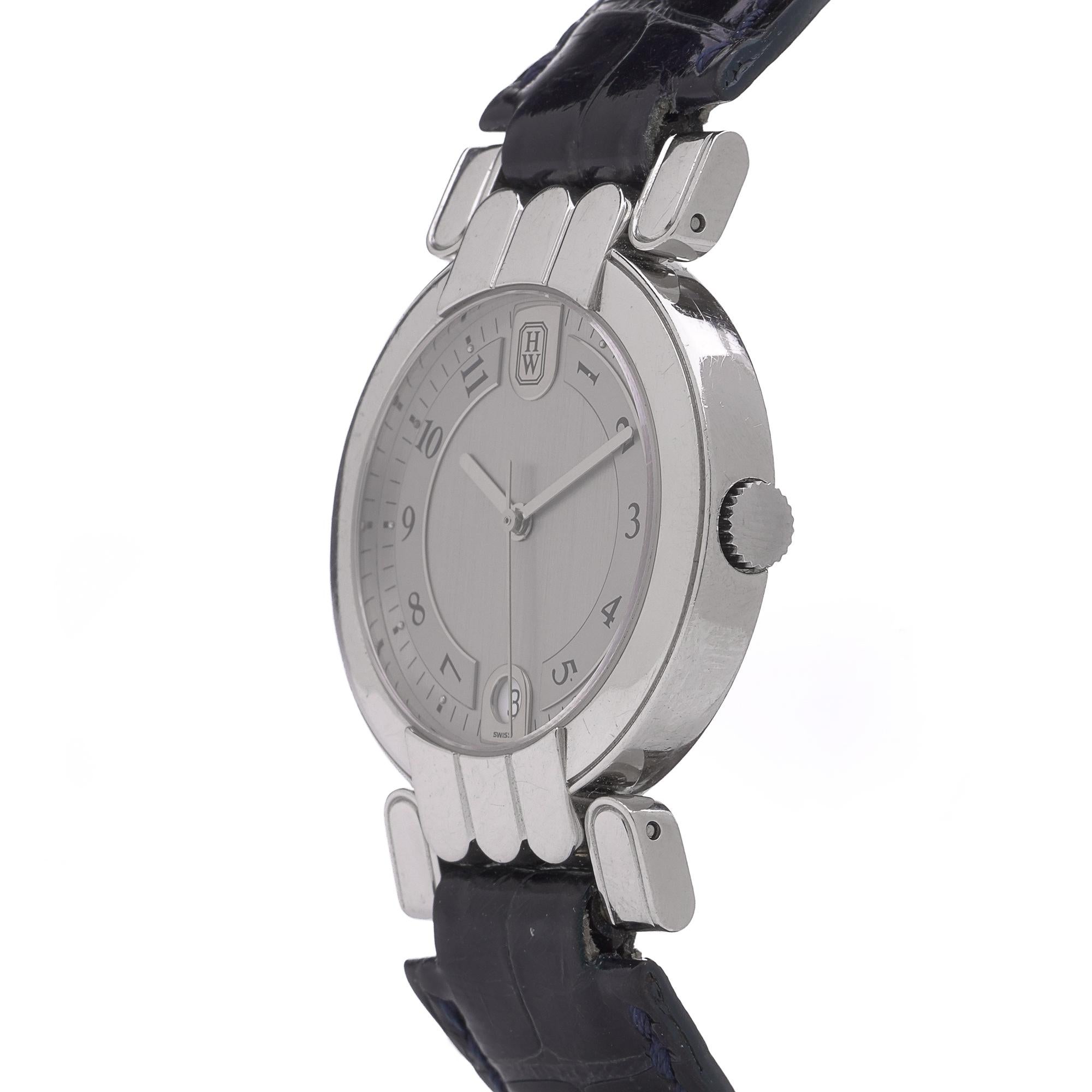 MONTRE HARRY WINSTON PREMIER AUTOMATIC PLATINUM & 18KT

Une montre-bracelet Harry Winston Premier raffinée, avec boîtier en platine et or 18 carats, mouvement automatique et fond saphir d'exposition. Le cadran argenté affiche des chiffres arabes