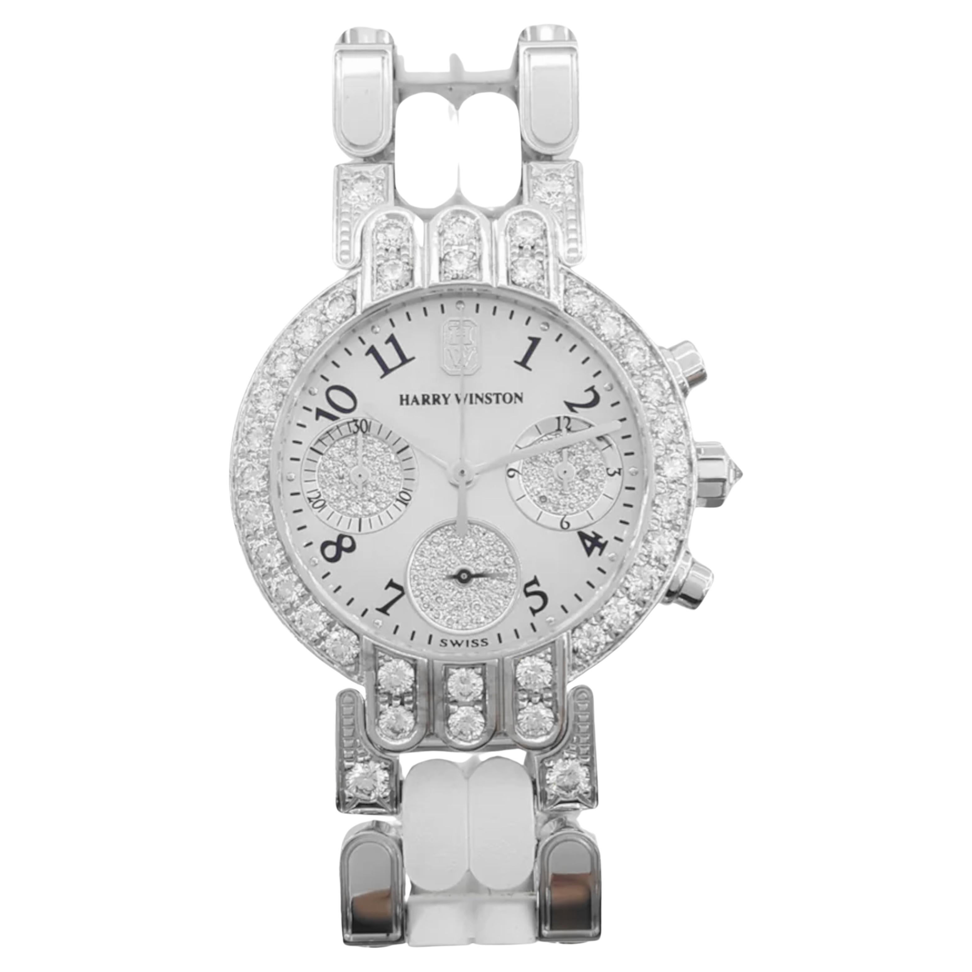 Harry Winston Premier Chronograph Automatic Watch Model 200UCQ32W is an exquisite timepiece known for its luxury and elegance. It features a round mother-of-pearl dial adorned with Arabic numeral indicators and three subsidiary dials for running
