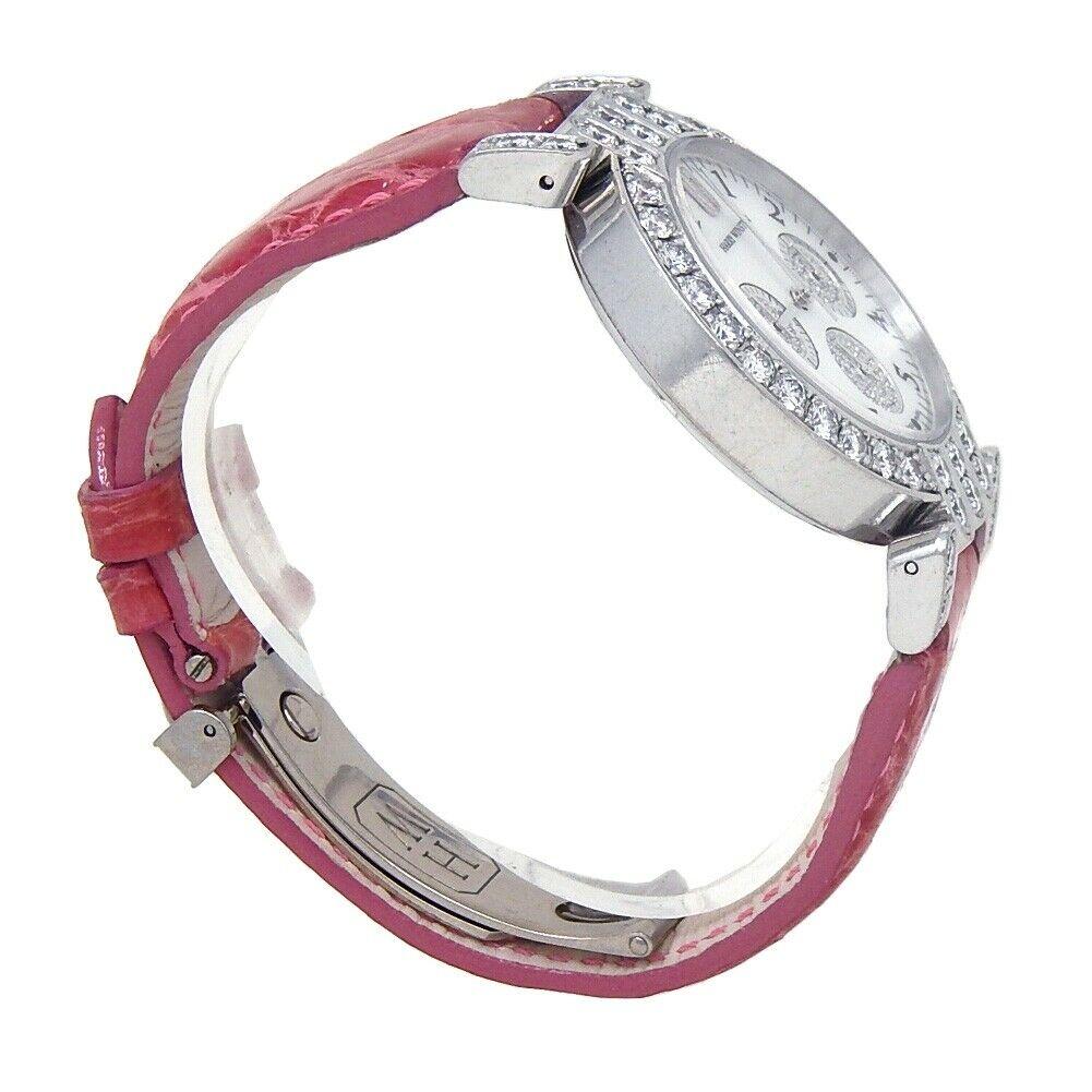 Brand: Harry Winston
Band Color: Pink	
Gender:	Women's
Case Size: 32-35.5mm	
MPN: Does Not Apply
Lug Width: 21mm	
Features:	12-Hour Dial, Arabic Numerals, Diamond Bezel, Diamond Dial, Gold Bezel, Sapphire Crystal, Swiss Made, Swiss Movement
Style: