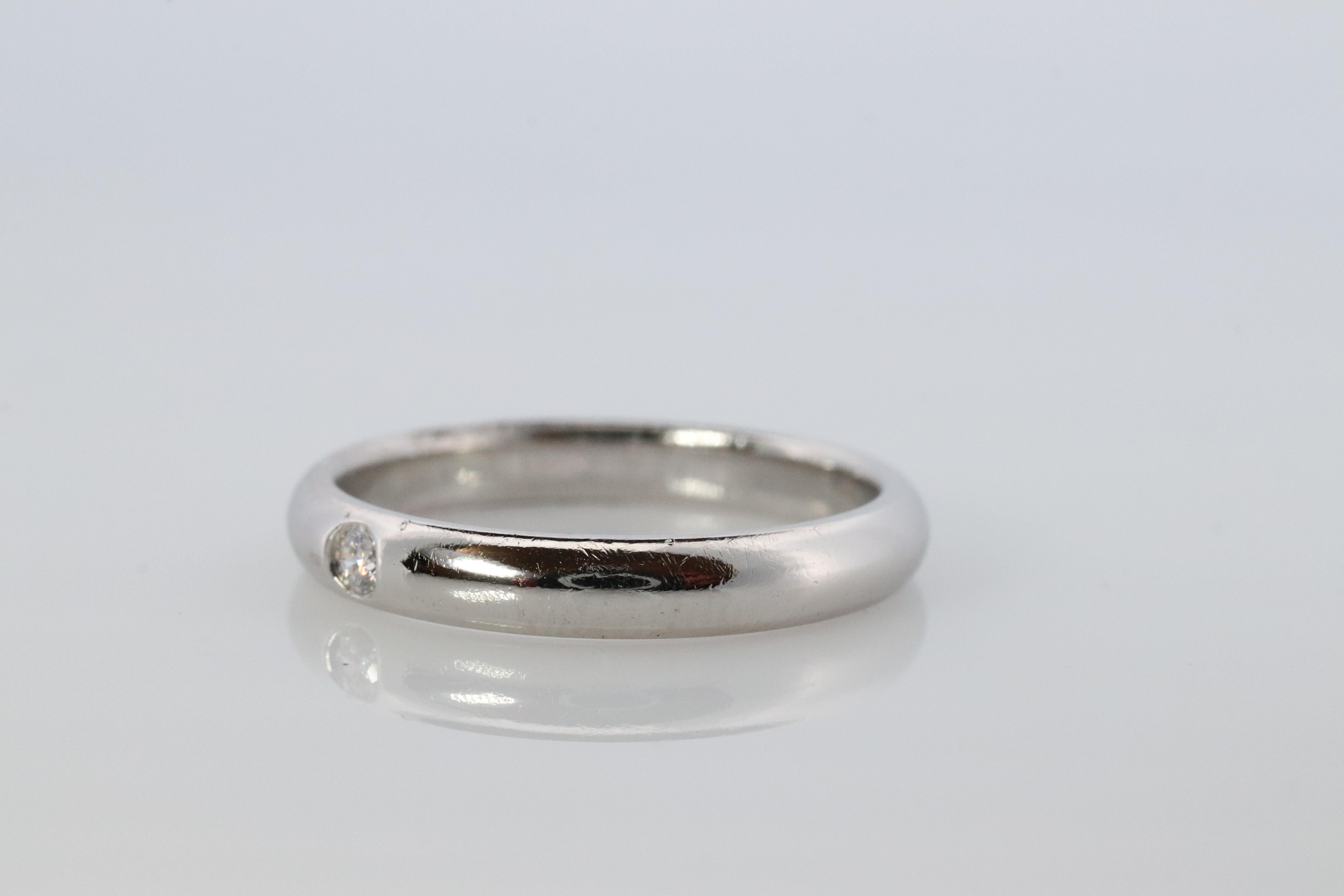 Authentic Harry Winston Ring

Round Cut Diamond Solitaire with a comfort wide band.


Comfort Fit

PT950 Platinum

2.5mm round cut diamond.

Size 7.5
3mm wide
5.8 grams
