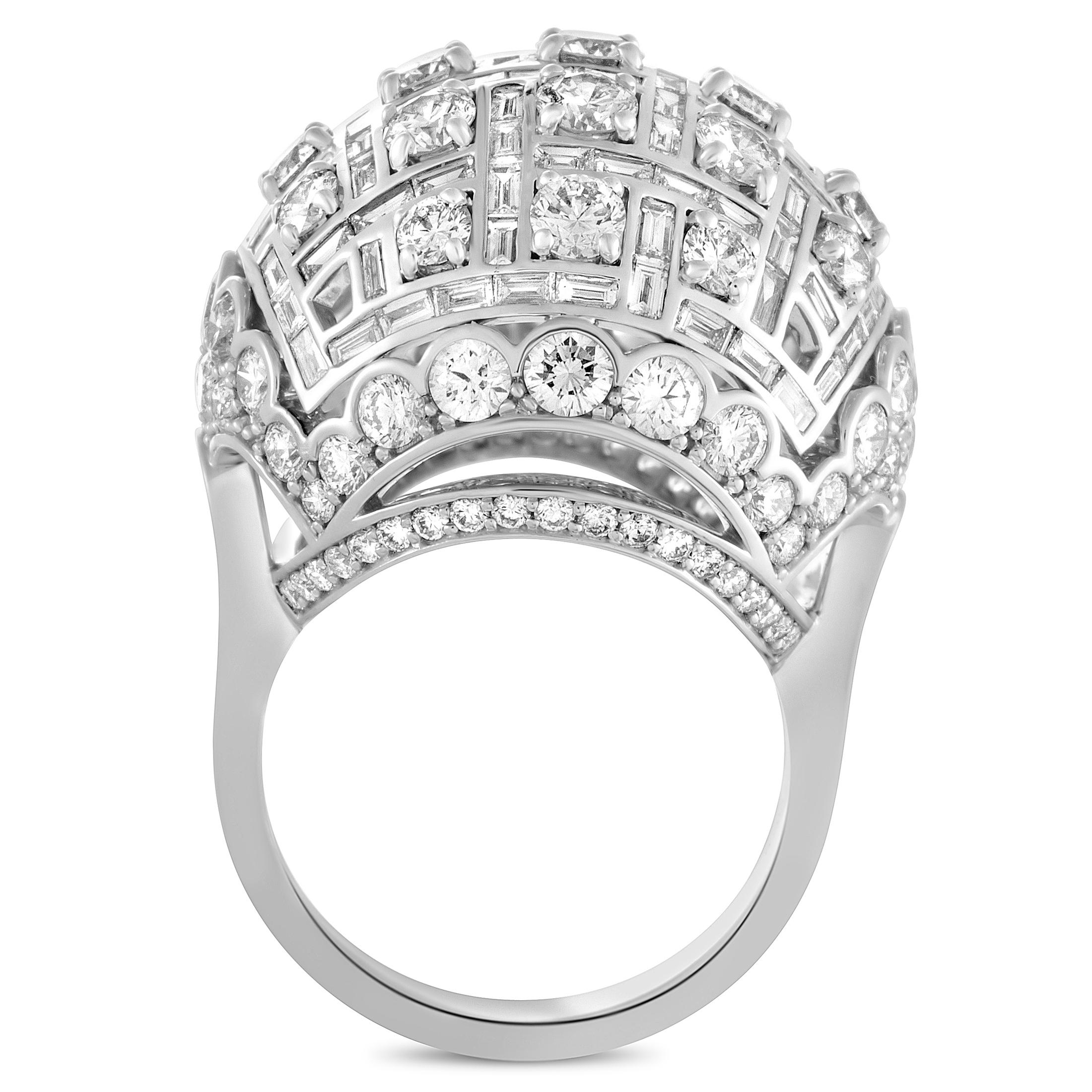A fabulous fusion of elegant golden sheen and lustrous diamond brilliance, this extravagant ring from Harry Winston offers an incredibly luxurious look. The ring is expertly crafted from 18K white gold and it is set with a plethora of round and