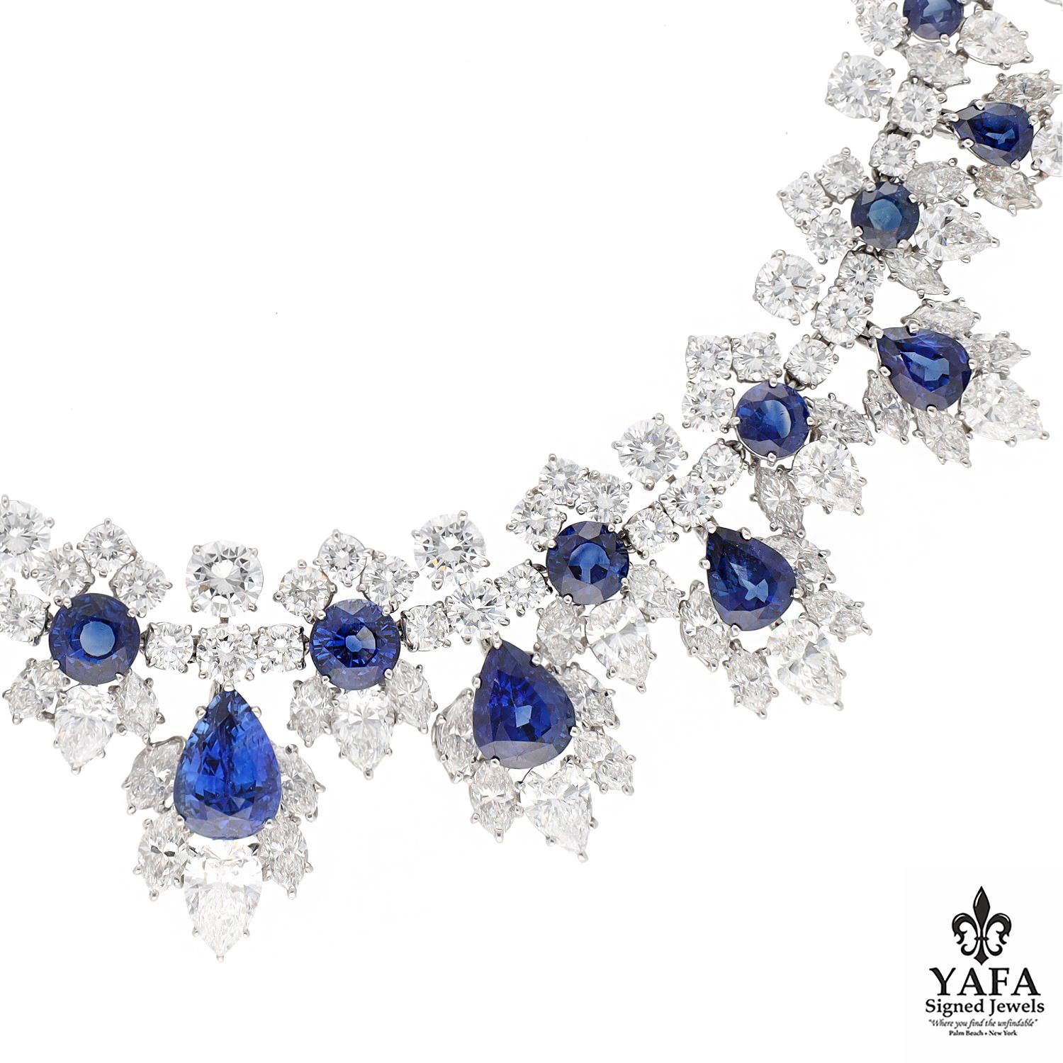 Experience the epitome of luxury with the exquisite Harry Winston Sapphire Diamond Necklace and Ear Clips, masterfully crafted in radiant platinum. This stunning parure is adorned with 38 magnificent sapphires, which collectively weigh an impressive