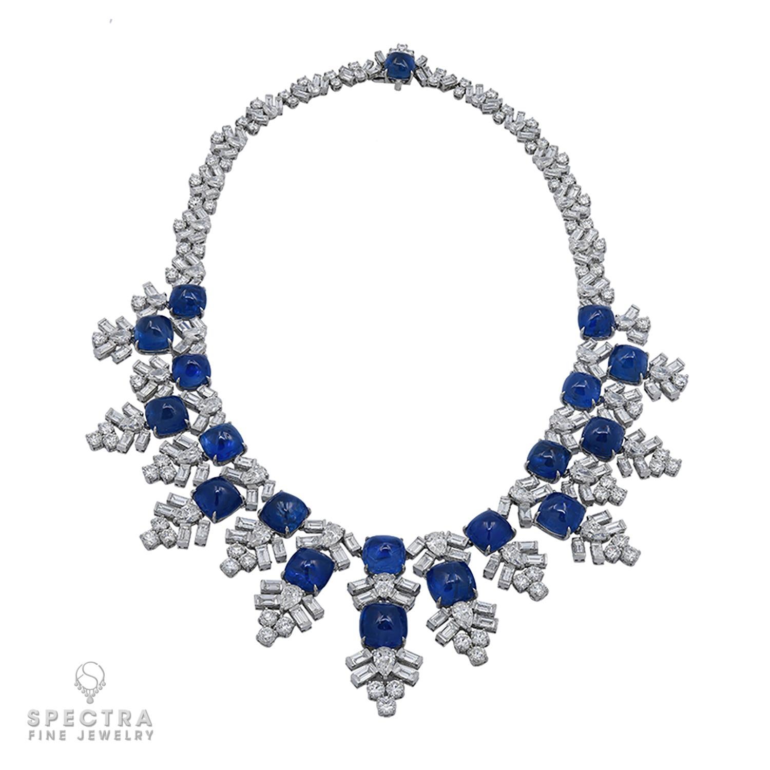 The Harry Winston Jacques Timey Vintage Sapphire Diamond Bib Necklace, crafted in the 20th century, showcases an Art Deco-inspired design in platinum, adorned with a plethora of diamonds and sapphires. Measuring 17.32 inches (44 cm) in length, it