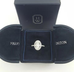 Harry Winston “The One” Oval-Shaped Diamond Micropavé Halo Engagement Ring