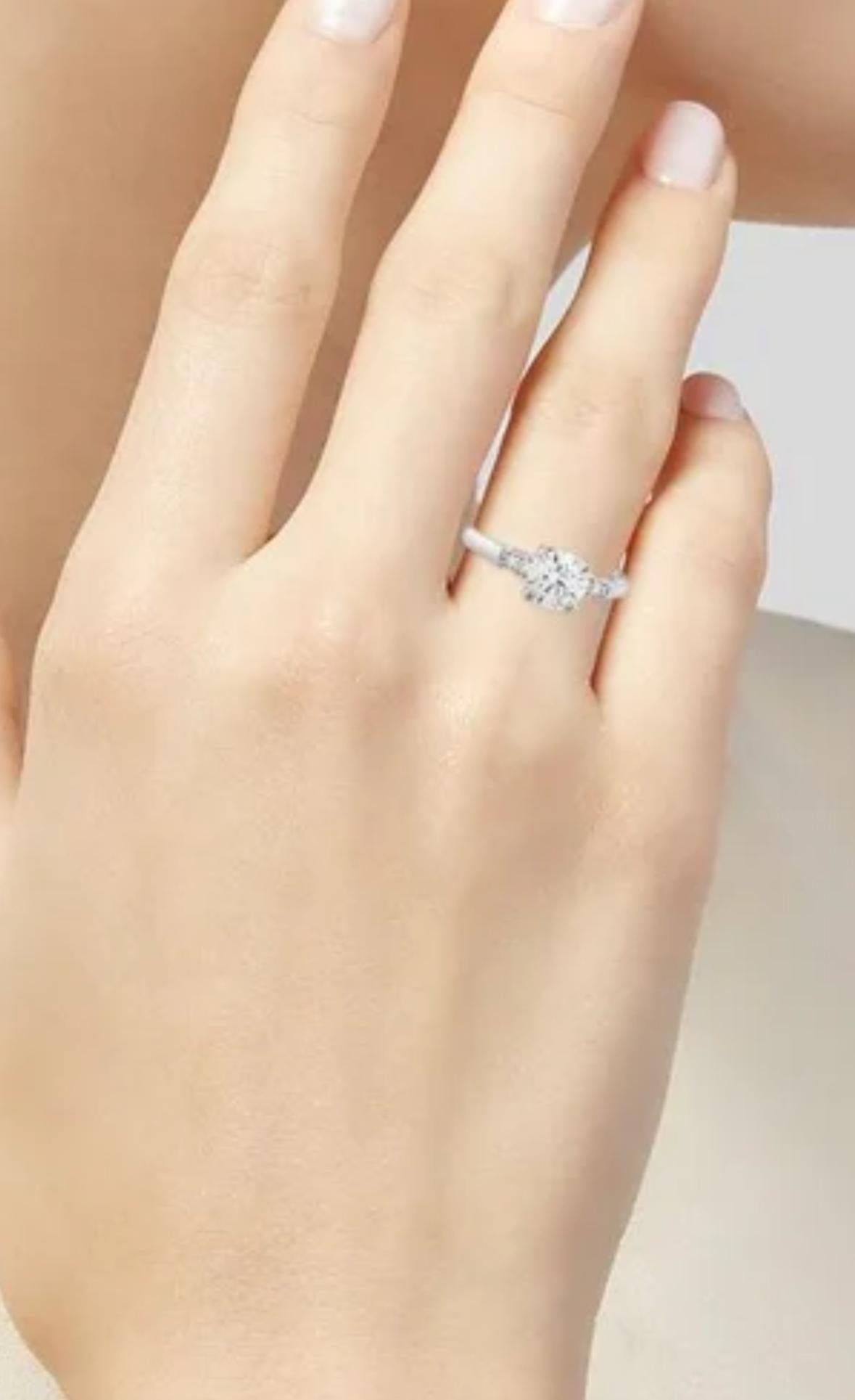 DeKara Design Estate Designer Collection 

Metal- 95% Platinum, 5% Iridium.

Stone- GIA Certified Round Diamonds E Color VS1 Clarity, 0.81 Carats. 4 Round E-F Color VS1 Round Diamonds, 0.06 Carats.

GIA Diamond Report Number 2136028272

An amazing