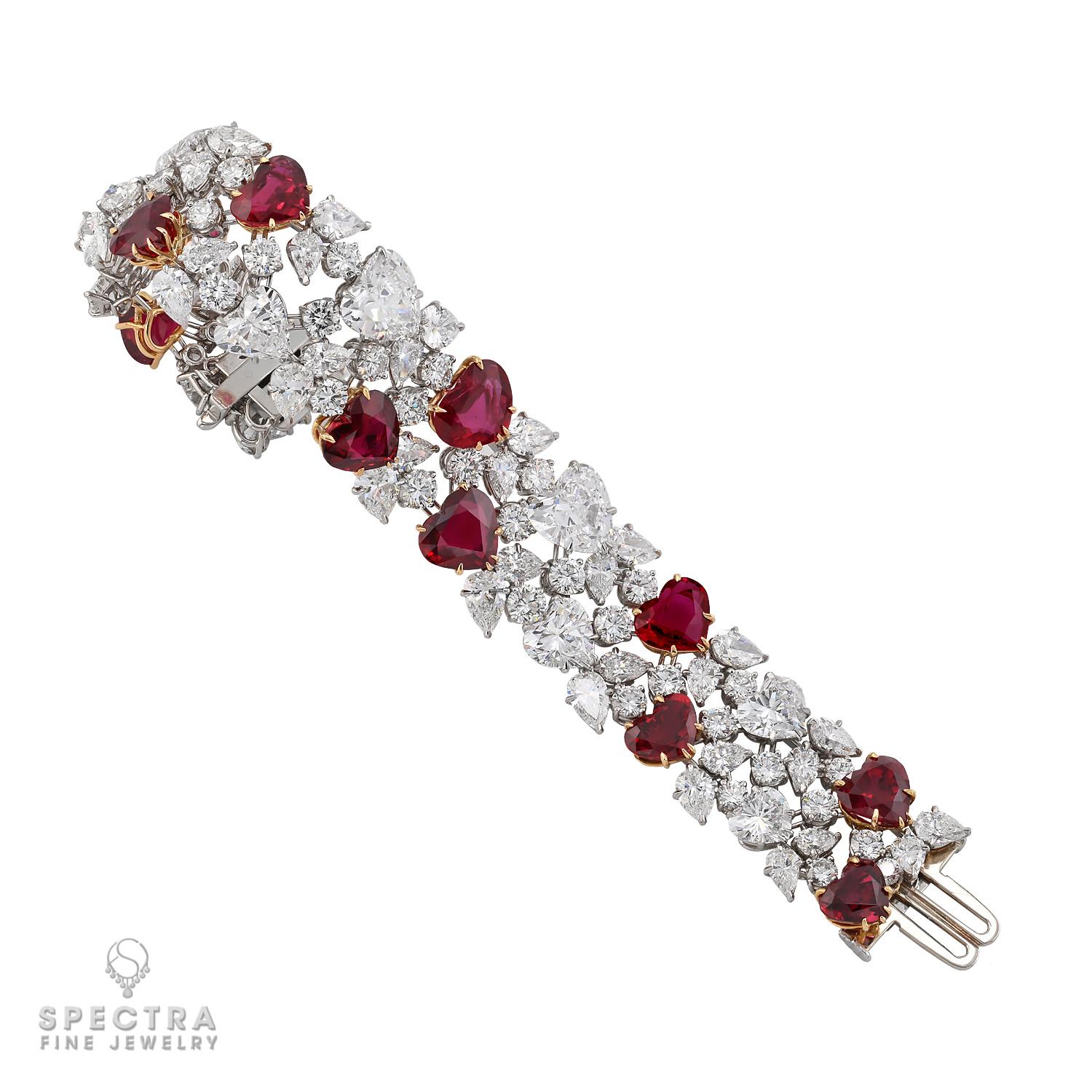 A stunning testament to timeless elegance, this Harry Winston vintage platinum ruby and diamond suite from the 1980s showcases the pinnacle of craftsmanship. Designed by the renowned Jacques Timey, the set features a necklace, bracelet, and