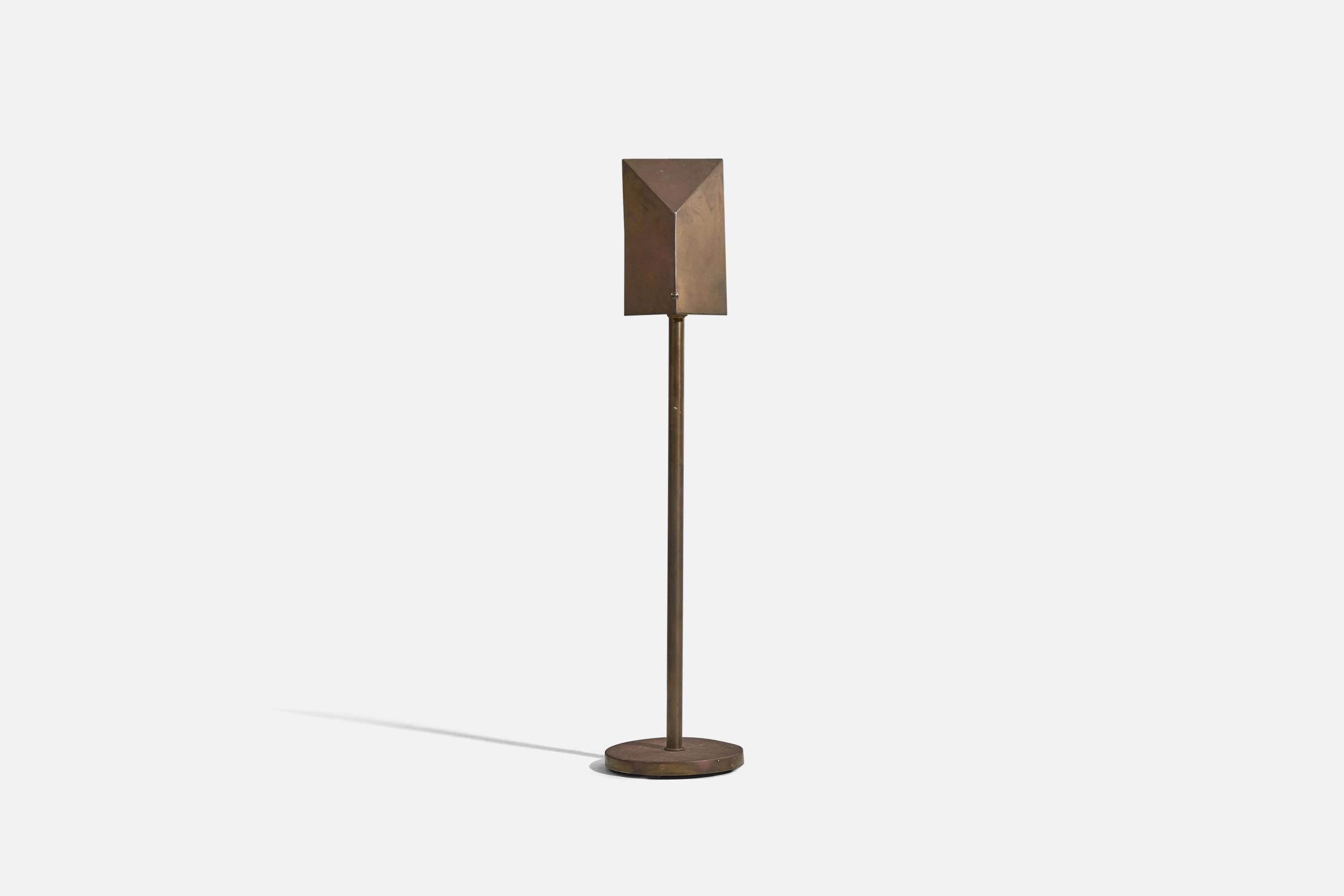 A brass floor lamp designed and produced by Hart Associates, United States, 1960s. With makers label.
  