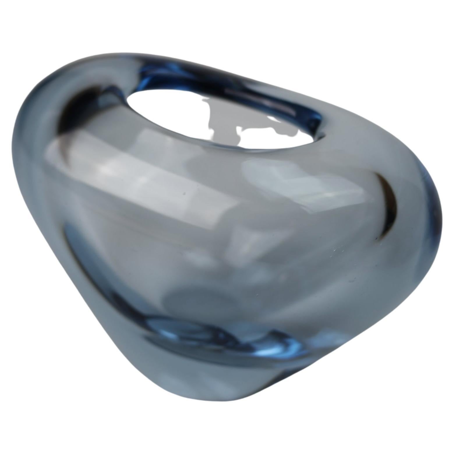 
A stunning Scandinavian aqua blue glass heart shaped 'Minuet' vase. Made by Holmegaard of Denmark and designed by Per Lütken

This unique handmade art piece is the perfect gift for a loved one and fits into every home making it a classic.