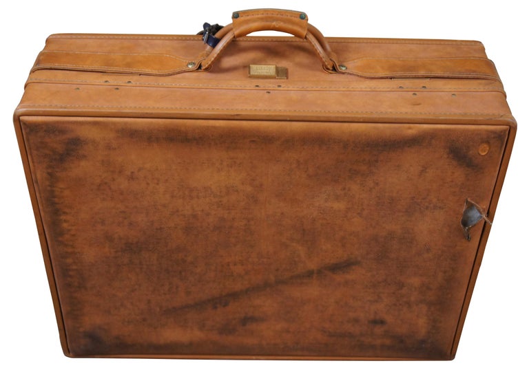 Hartmann - Porte-clés de valise de voyage en cuir beige avec ceinture et  motif cachemire En vente sur 1stDibs