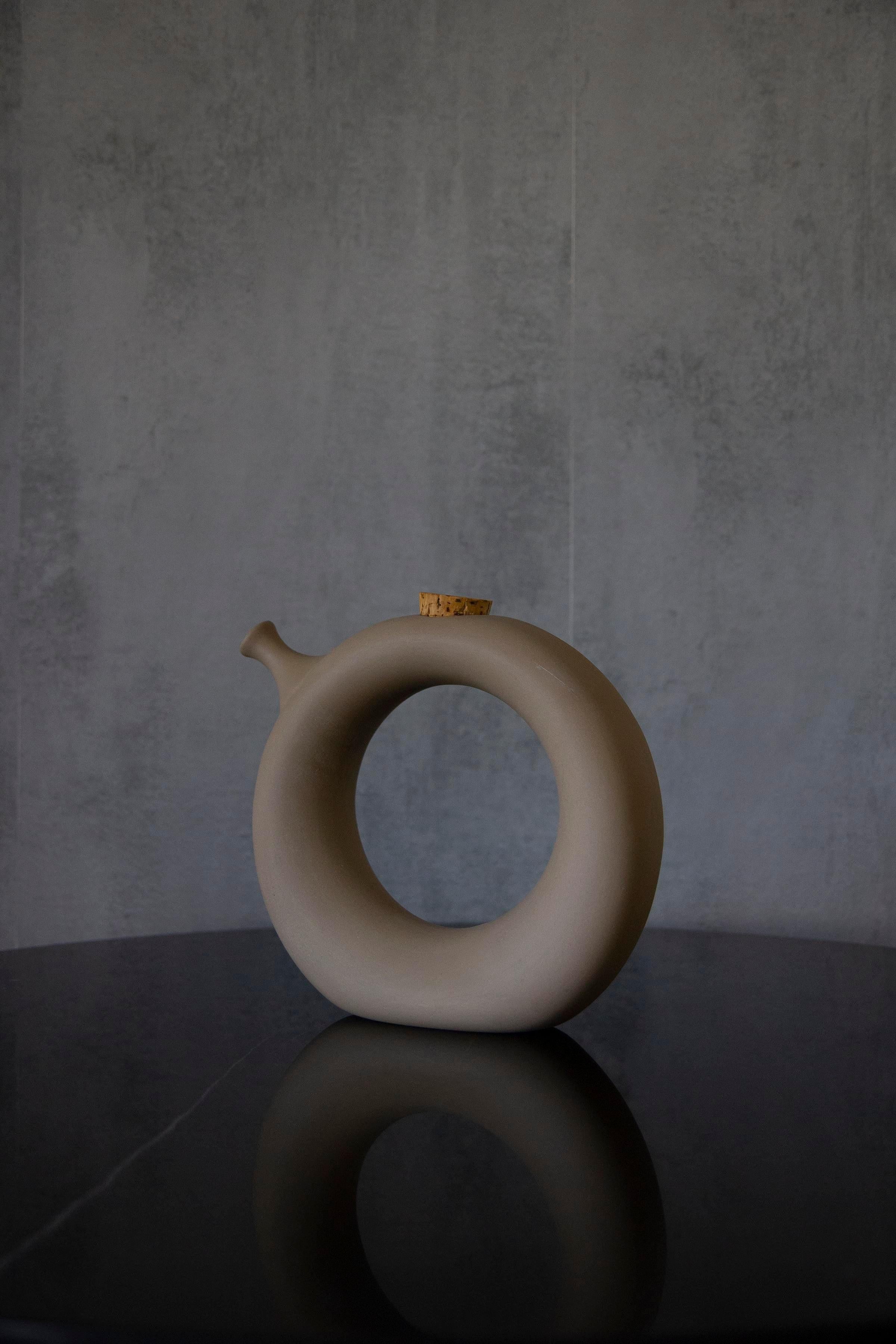 Mid-Century Modern period donut shape pottery pitcher jug by Hartstone pottery.
