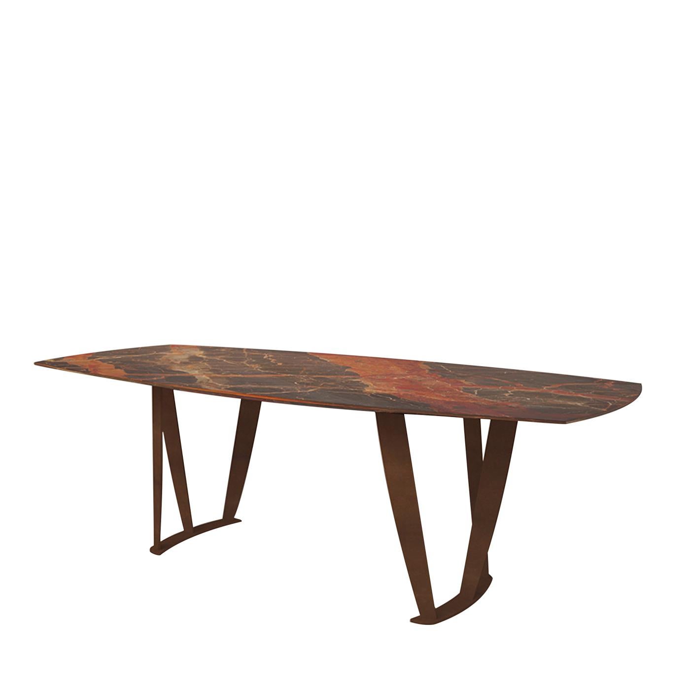 This modern and sophisticated dining table is a work of art that will create a stately effect in a contemporary home, thanks to the striking balance between the unique silhouette of its two sculptural legs in bronze-finished steel and the exquisite