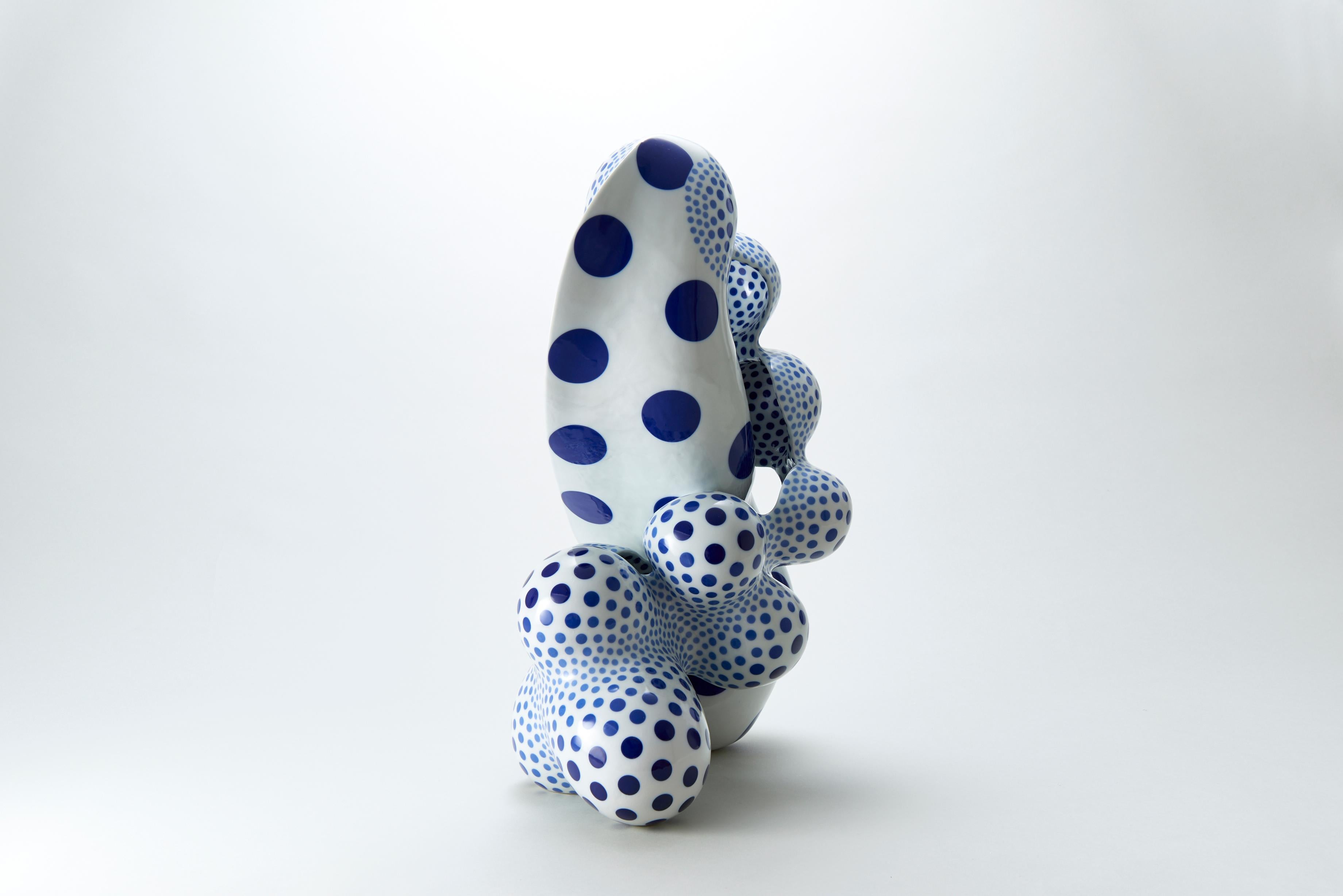 Japanese artist Harumi Nakashima creates free-form ceramic sculptures that feature organic, yet psychedelic characteristics. Nakashima, mostly known for beautifully structured, odd geometric shapes embellished with iconic polka dots, works with a