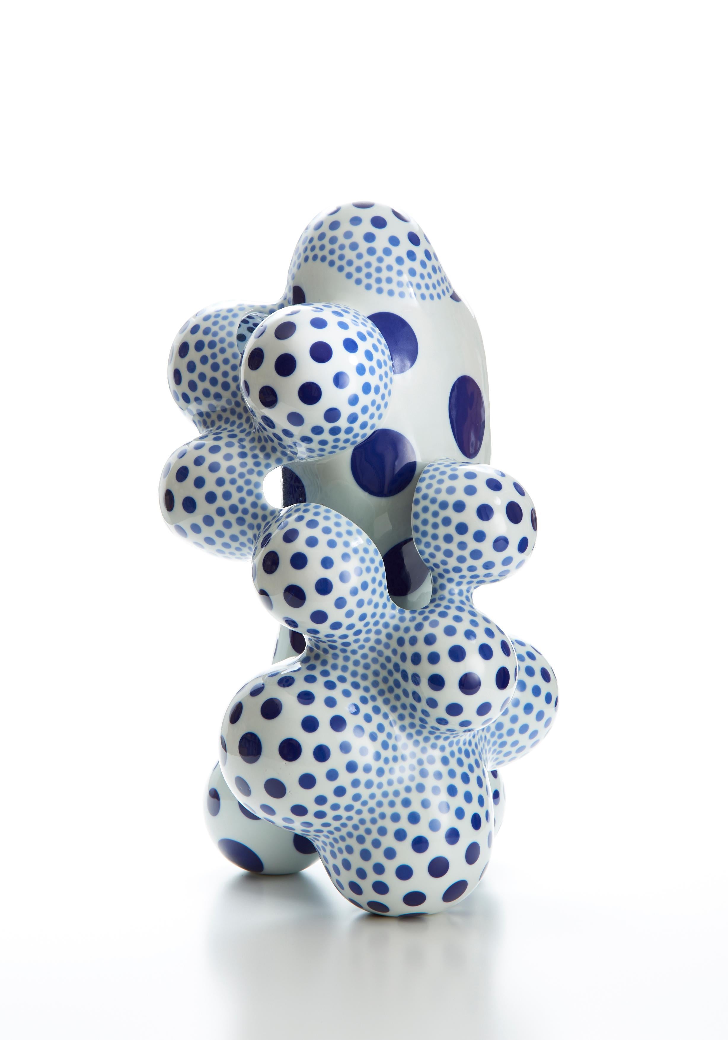 Japanese artist Harumi Nakashima creates free-form ceramic sculptures that feature organic, yet psychedelic characteristics. Nakashima, mostly known for beautifully structured, odd geometric shapes embellished with iconic polka dots, works with a