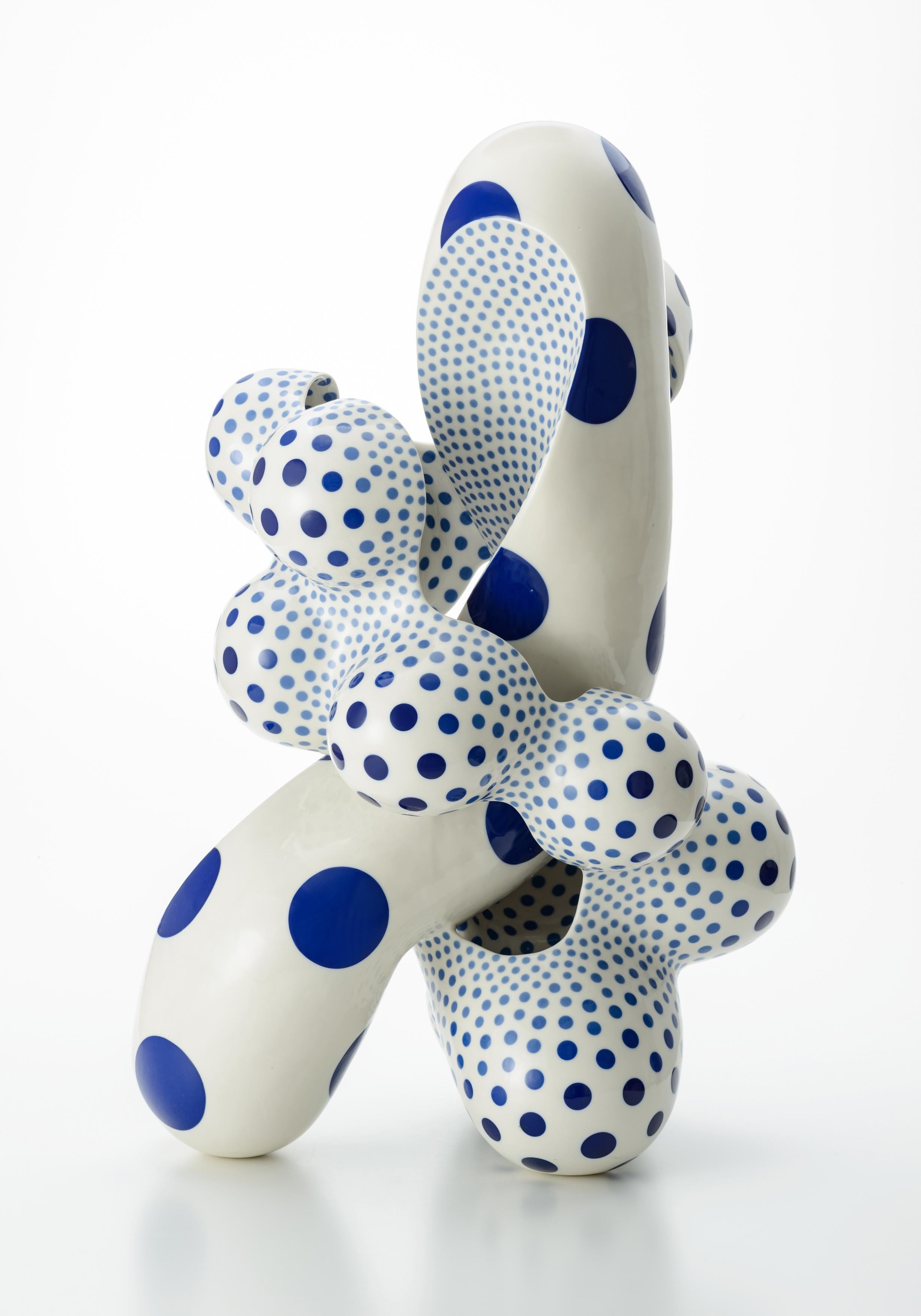 Japanese artist Harumi Nakashima creates free-form ceramic sculptures that feature organic, yet psychedelic characteristics. Nakashima, mostly known for beautifully structured, odd geometric shapes embellished with iconic polka dots, works with a