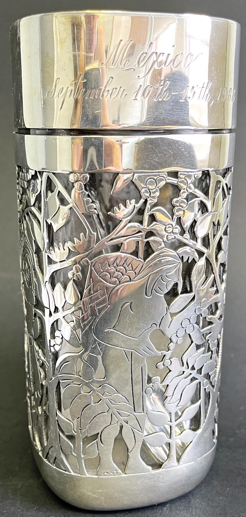 A remarkable piece of sterling silver artistry and commercial history, this pierced silver container was commissioned by the Nestlé company to mark a visit by its Board of Directors to Mexico in 1988. Nestlé has had a major presence in Mexico for
