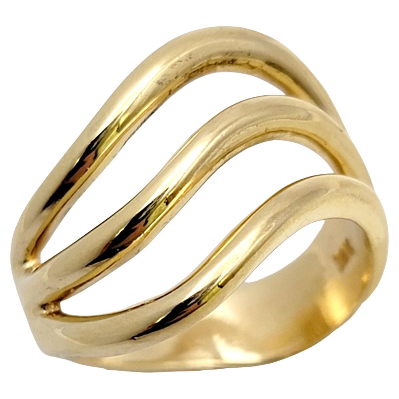 Ring size: 7.25

Simple yet stunning 18 karat yellow gold band ring by Native American jeweler Harvey Begay. This unique contoured piece gives off a stylish, modern vibe while gently hugging the finger. You will adore this ring! 

The elegant band